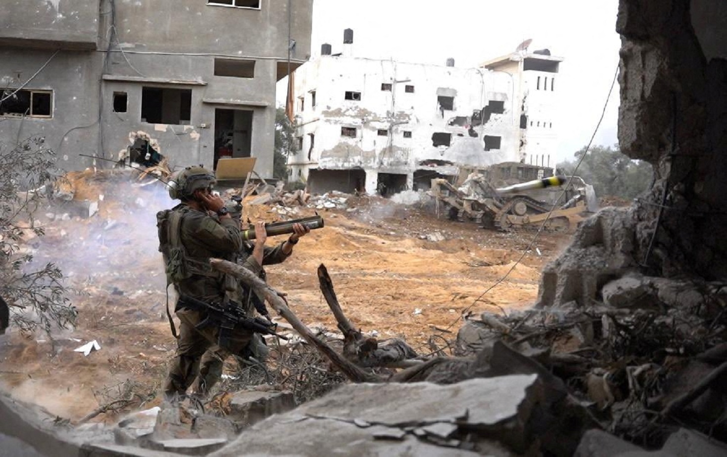 Israeli soldiers operate in the Gaza Strip amid the ongoing conflict between Israel and the Palestinian Islamist group Hamas, in this handout picture released on December 14, 2023. Israel Defense Forces