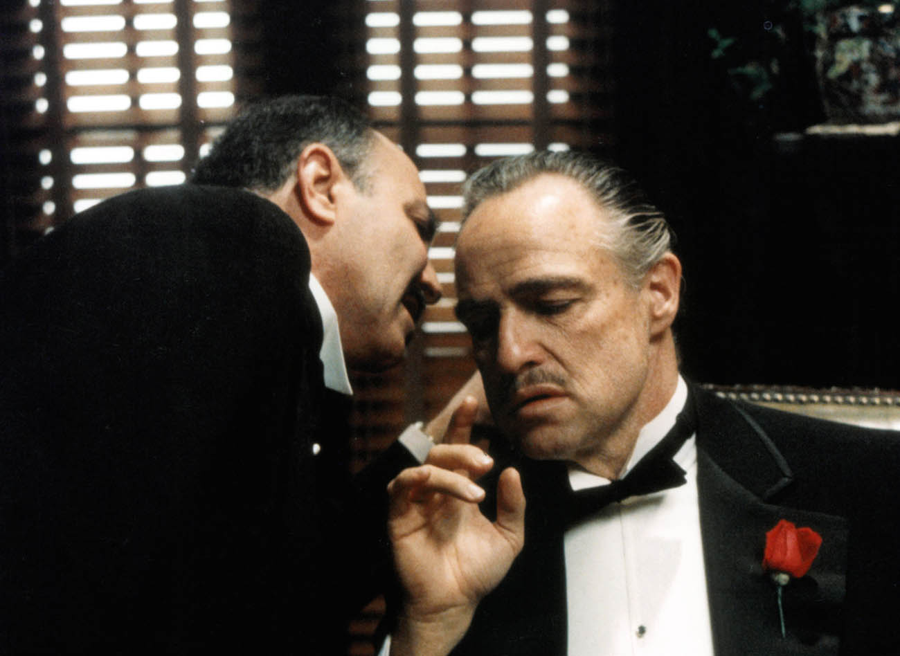 Marlon Brando receives a message in a scene from the film 'The Godfather', 1972. (Photo by Paramount