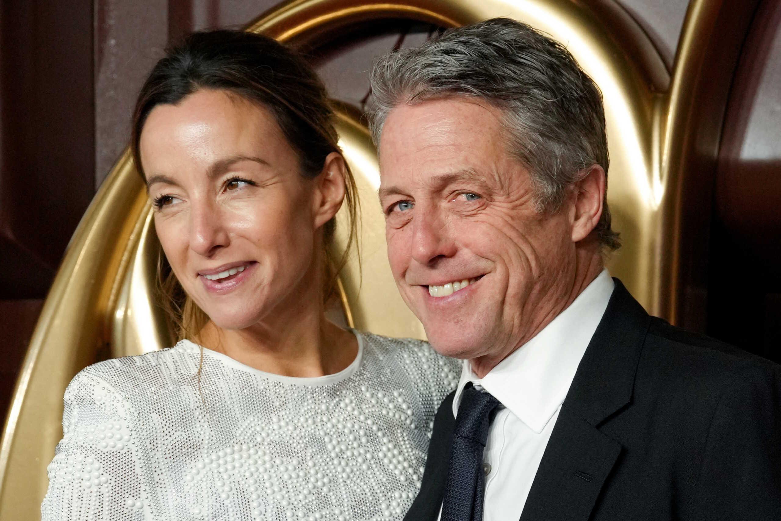 Cast member Hugh Grant and Anna Elisabet Eberstein attend the world premiere of "Wonka", at Royal Festival Hall, in London, Britain, November 28, 2023. REUTERS