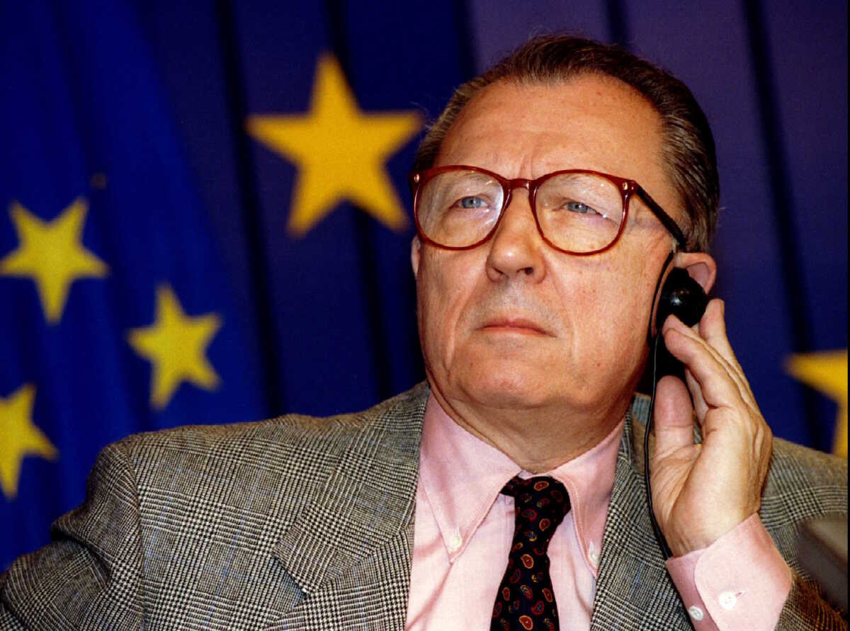 FILE PHOTO: European Union President Jacques Delors listens to a question during a press conference on the book "In search of Europe" October 21, 1994, at the EU headquarters. REUTERS