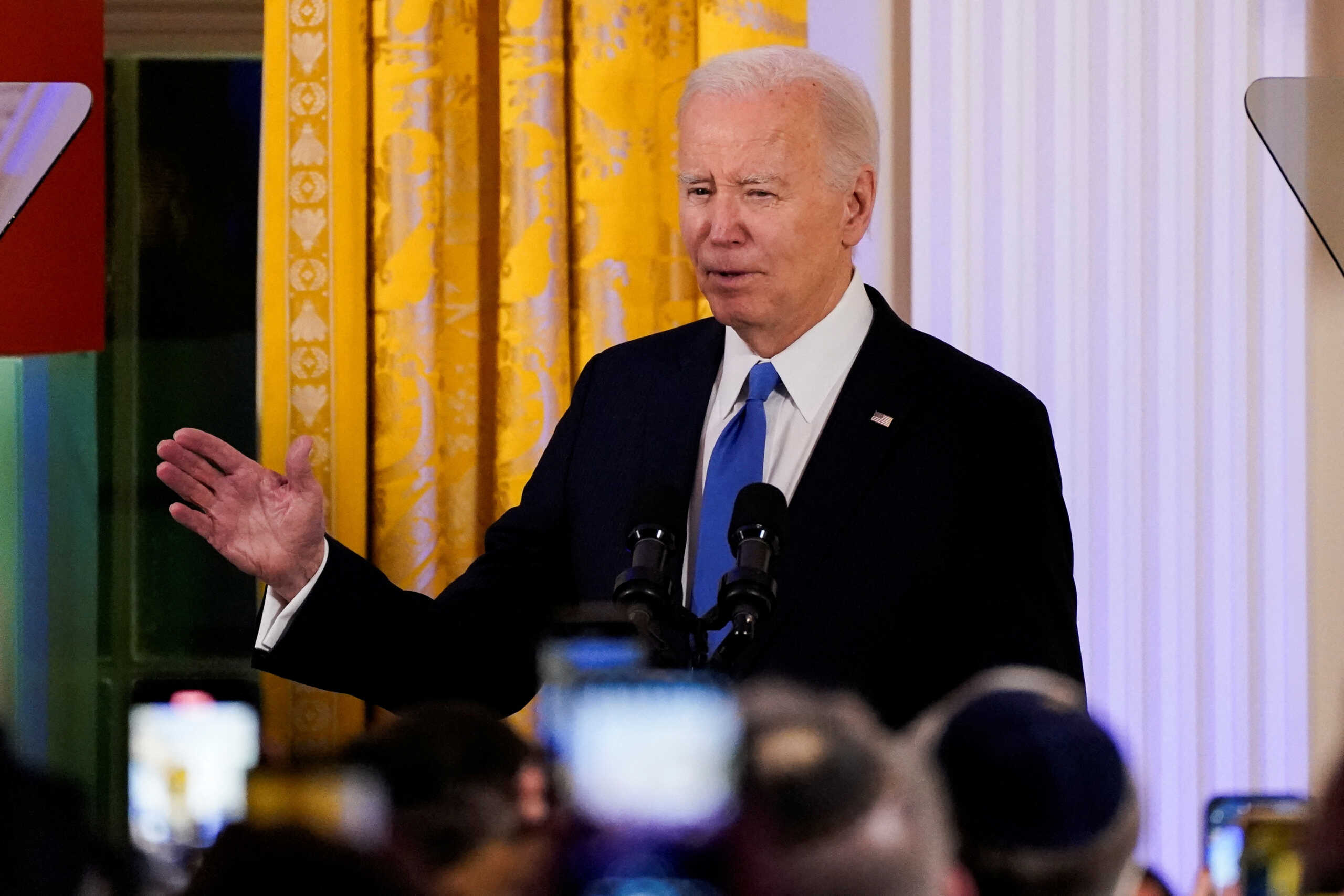 U.S. President Joe Biden delivers remarks during a Hanukkah reception at the White House in Washington, U.S., December 11, 2023. REUTERS