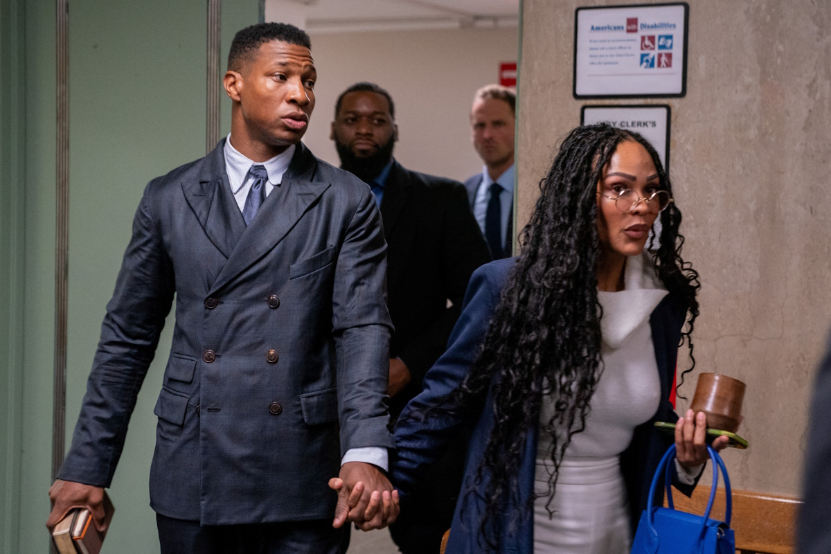 Actor Jonathan Majors arrives with Meagan Good for his assault and harassment case at Manhattan Criminal Court in New York City, U.S., December 15, 2023. REUTERS