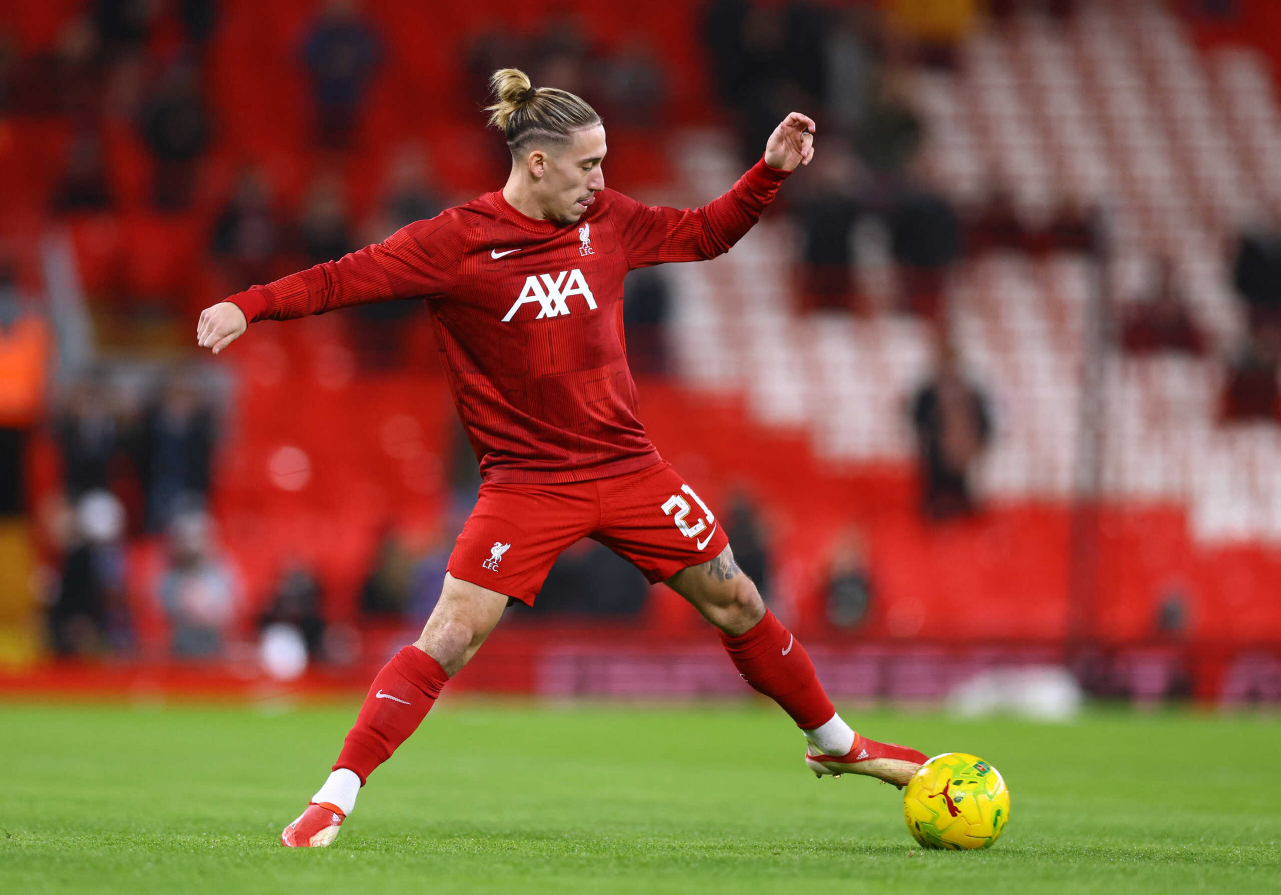 Soccer Football - Carabao Cup - Quarter Final - Liverpool v West Ham United - Anfield, Liverpool, Britain - December 20, 2023 Liverpool's Kostas Tsimikas during the warm up before the match REUTERS