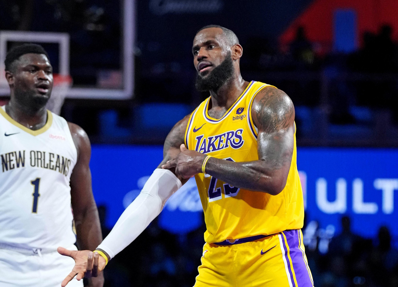 Dec 7, 2023; Las Vegas, Nevada, USA; Los Angeles Lakers forward LeBron James (23) reacts to a shot in front of New Orleans Pelicans forward Zion Williamson (1) during the third quarter in the NBA In Season Tournament Semifinal at T-Mobile Arena. Mandatory Credit: Kyle Terada-USA TODAY Sports