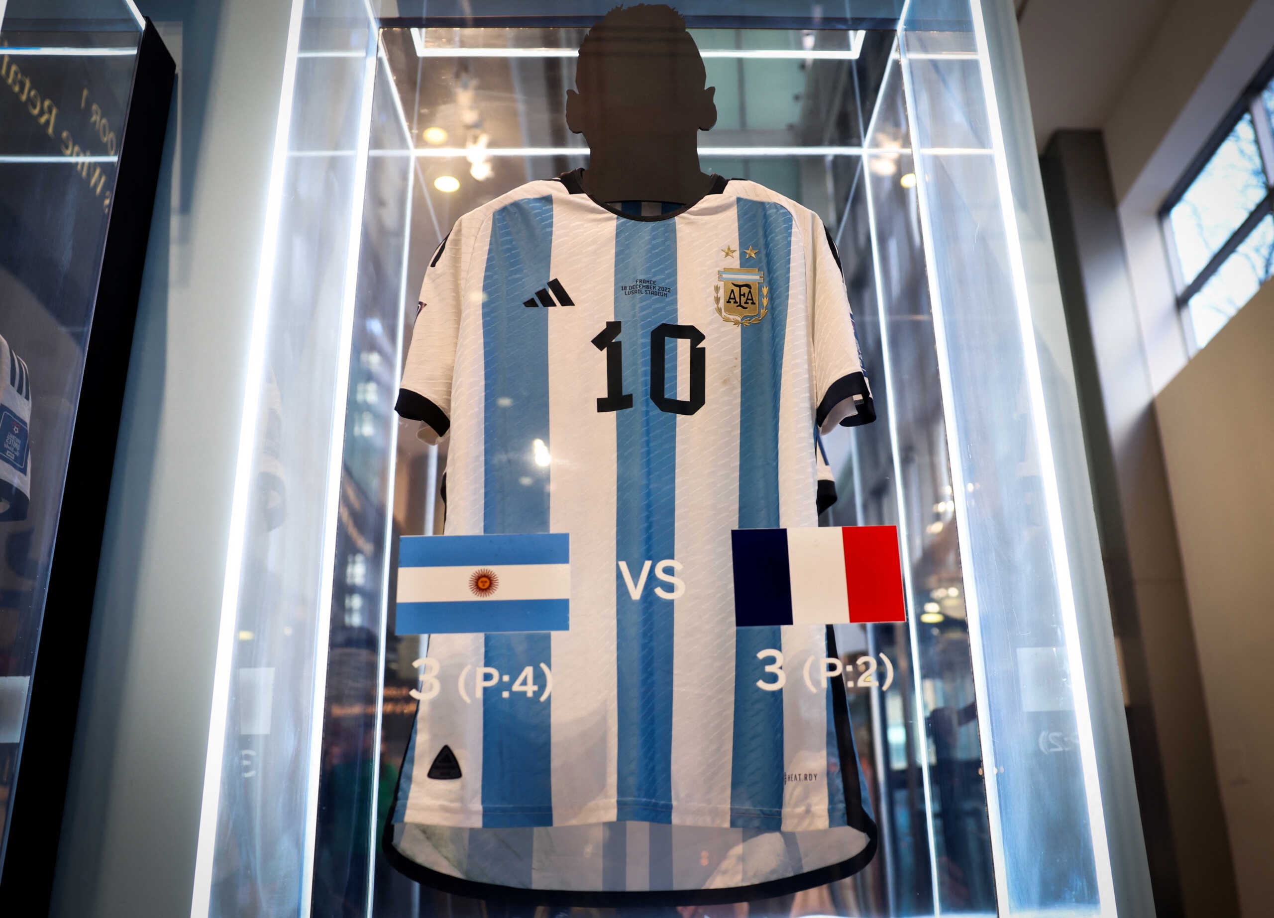 The match shirt Argentina's Lionel Messi wore during the 2022 FIFA World Cup in Qatar is displayed during a press preview ahead of their auction at Sotheby's in New York City, U.S., November 30, 2023. REUTERS