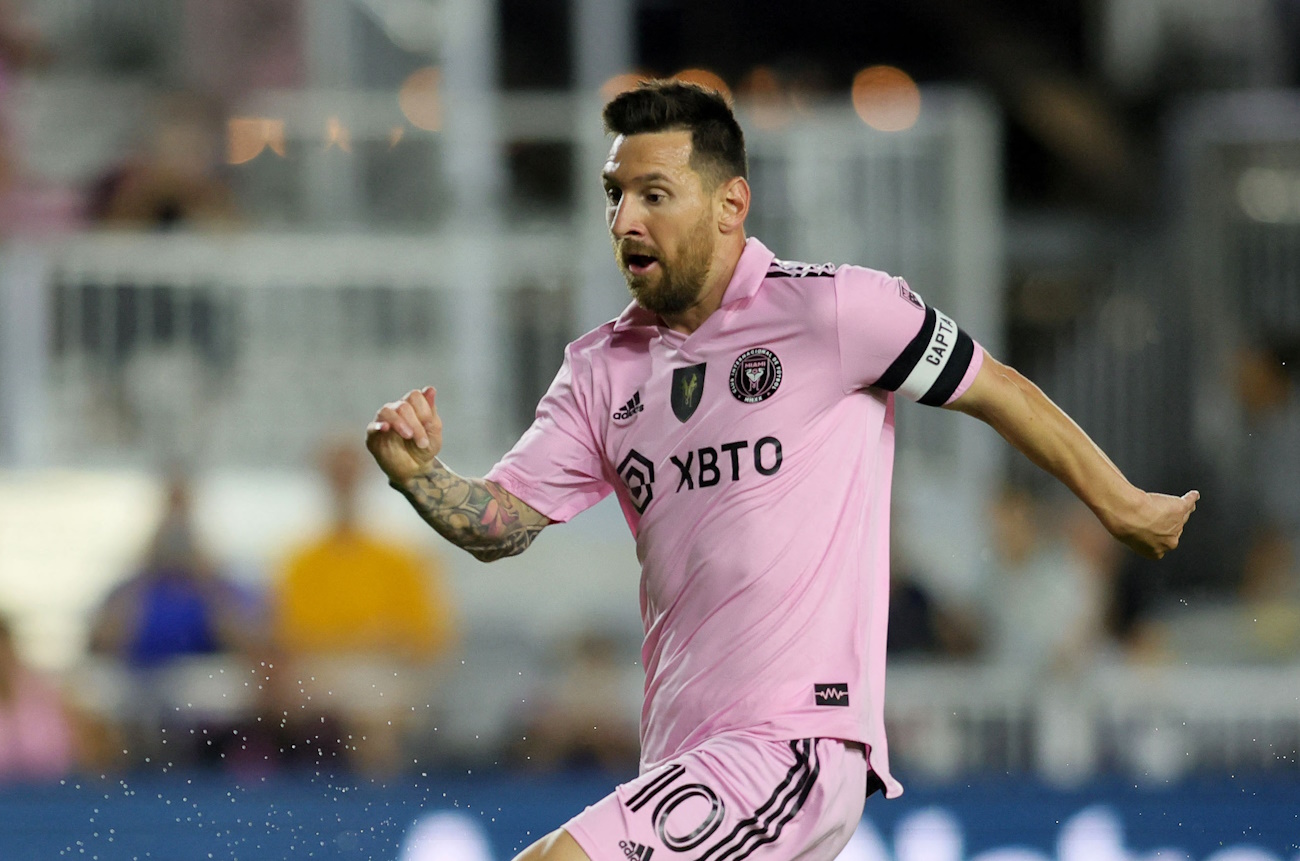 Nov 10, 2023; Lauderdale, FL, USA; Inter Miami forward Lionel Messi (10) kicks the ball past New York City midfielder Andres Perea (15) during the first half at DRV PNK Stadium. Mandatory Credit: Sam Navarro-USA TODAY Sports