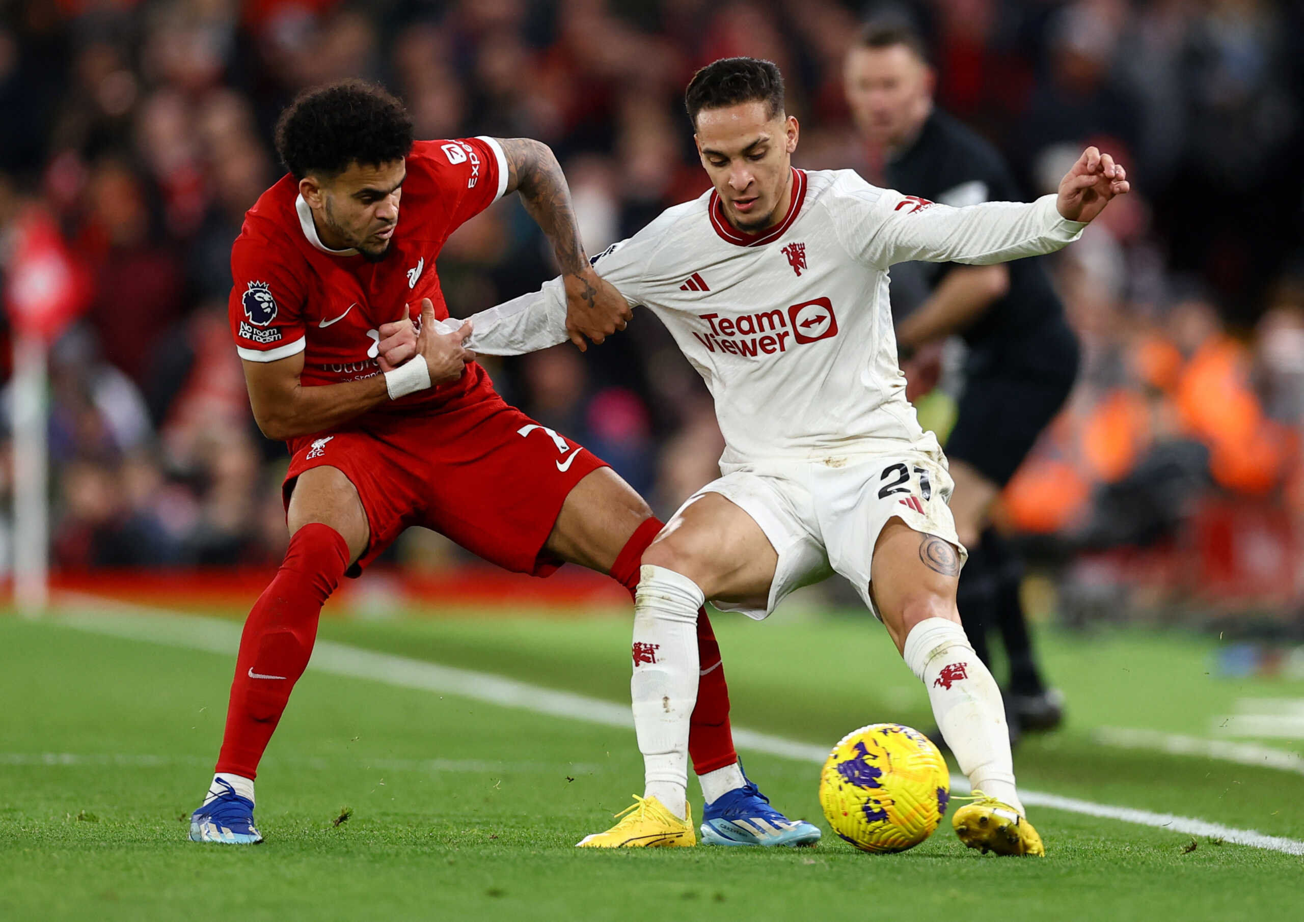 Soccer Football - Premier League - Liverpool v Manchester United - Anfield, Liverpool, Britain - December 17, 2023 Manchester United's Antony in action with Liverpool's Luis Diaz REUTERS