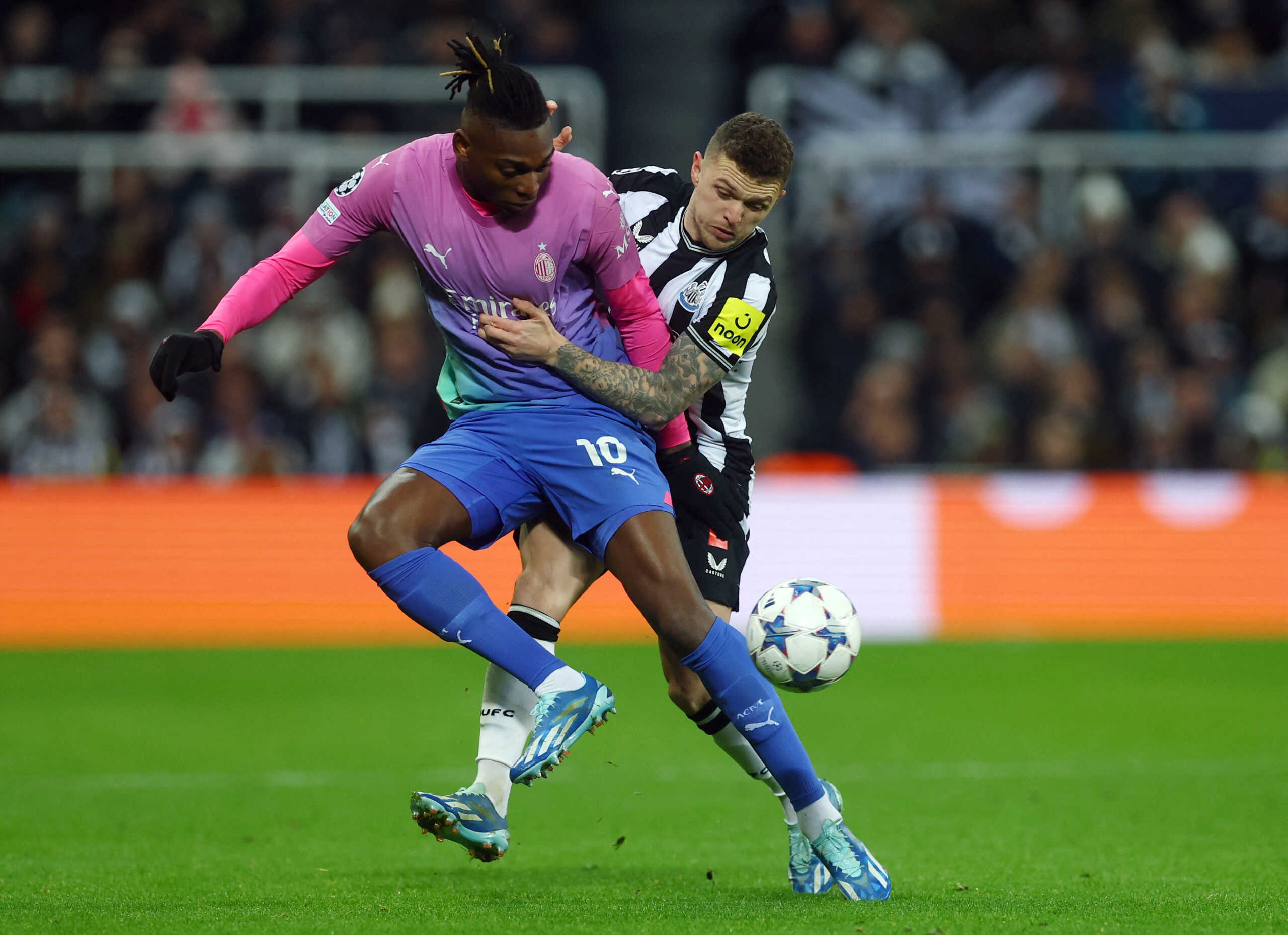 Soccer Football - Champions League - Group F - Newcastle United v AC Milan - St James' Park, Newcastle, Britain - December 13, 2023 AC Milan's Rafael Leaon in action with Newcastle United's Kieran Trippier Action Images via Reuters