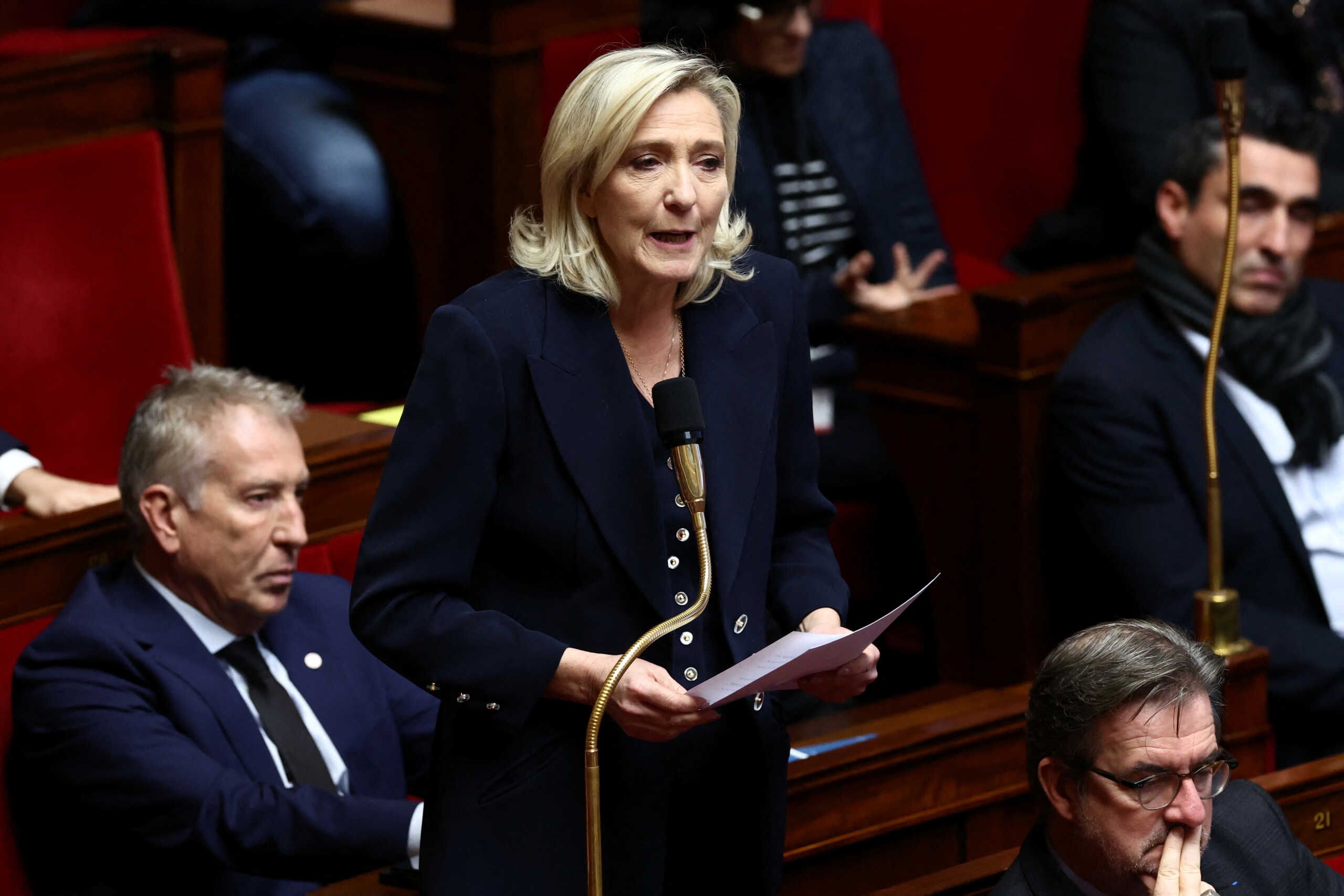Marine Le Pen, member of parliament and president of the French far-right National Rally (Rassemblement National - RN) party parliamentary group, speaks during the questions to the government session at the National Assembly in Paris, France, December 5, 2023. REUTERS