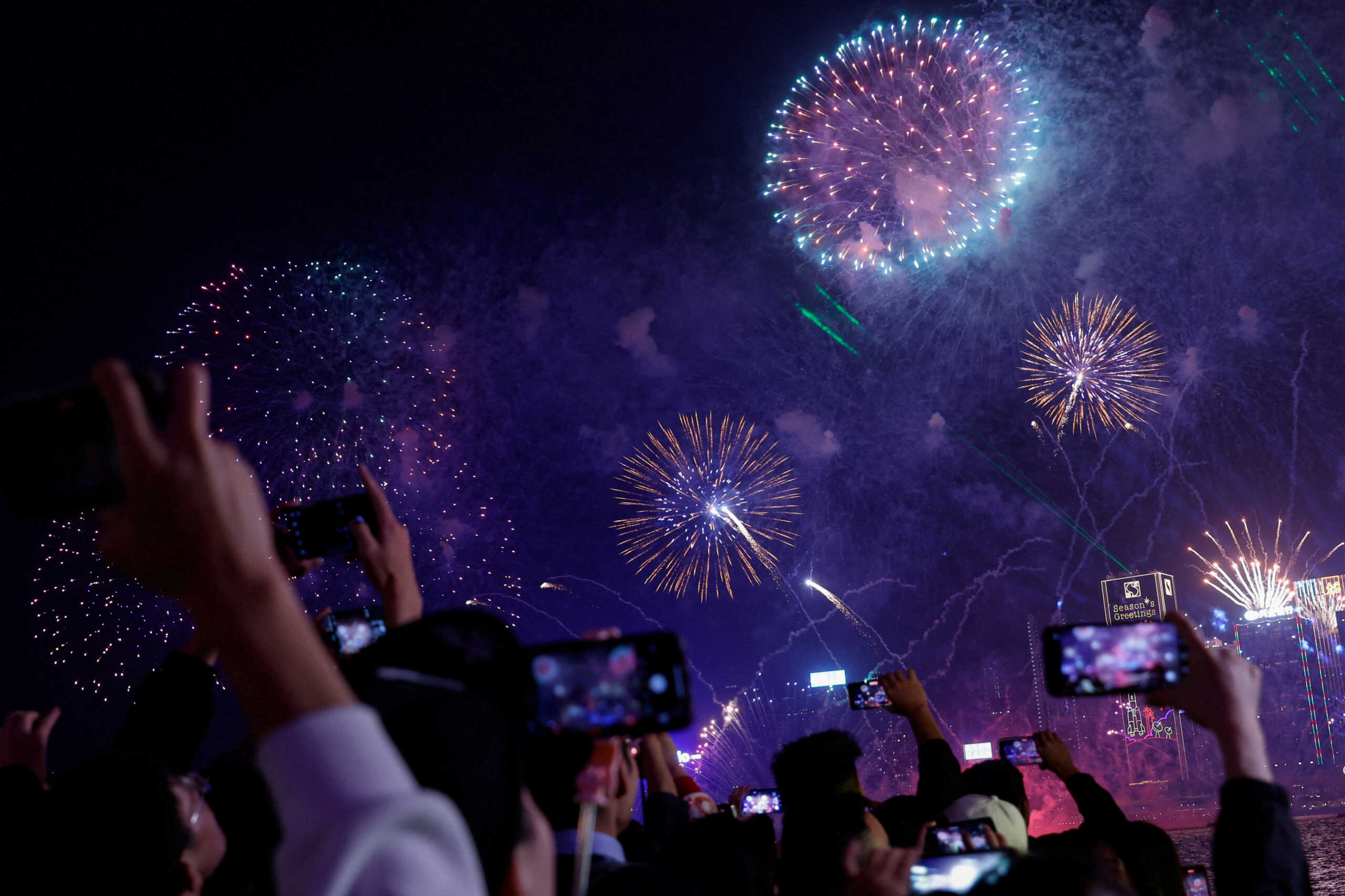 Fireworks explode over Victoria Harbour to celebrate the New Year in Hong Kong, China January 1, 2024. REUTERS