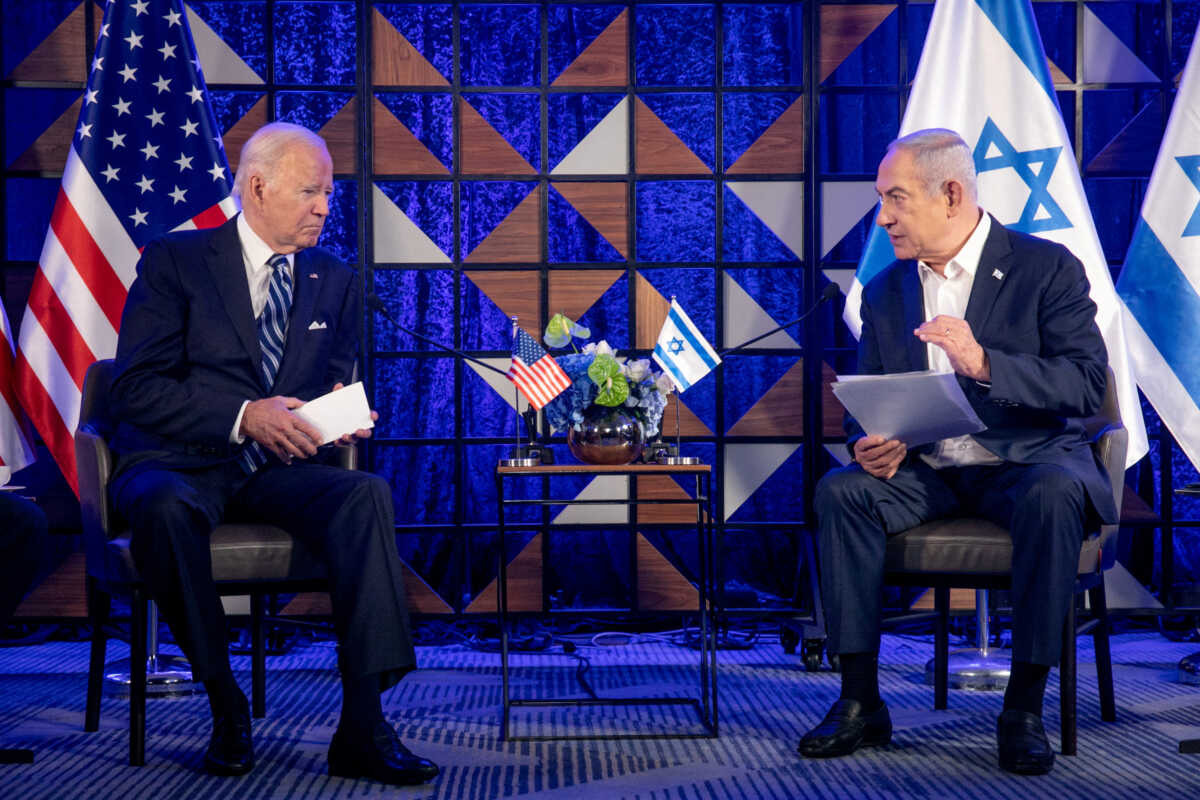 FILE PHOTO: U.S. President Joe Biden, left, meets with Israeli Prime Minister Benjamin Netanyahu, right, to discuss the ongoing conflict between Israel and Hamas, in Tel Aviv, Israel, Wednesday, Oct. 18, 2023. Miriam Alster
