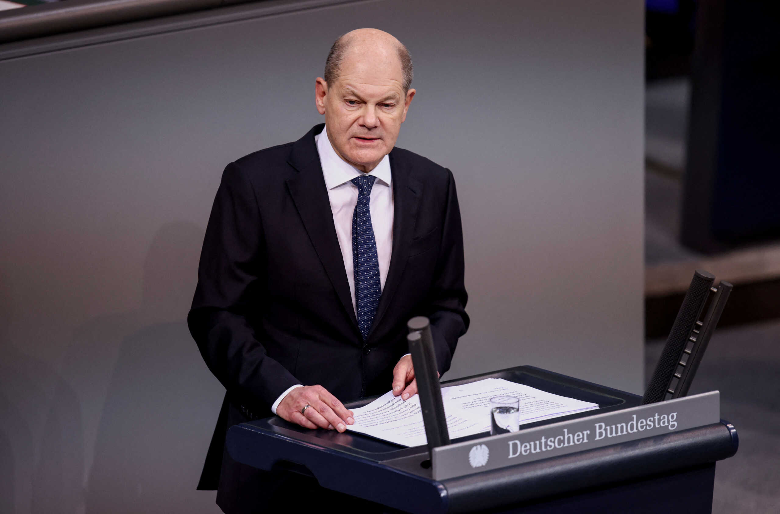 German Chancellor Olaf Scholz addresses a session of the lower house of the Parliament, the Bundestag, in Berlin, Germany, December 13, 2023. REUTERS