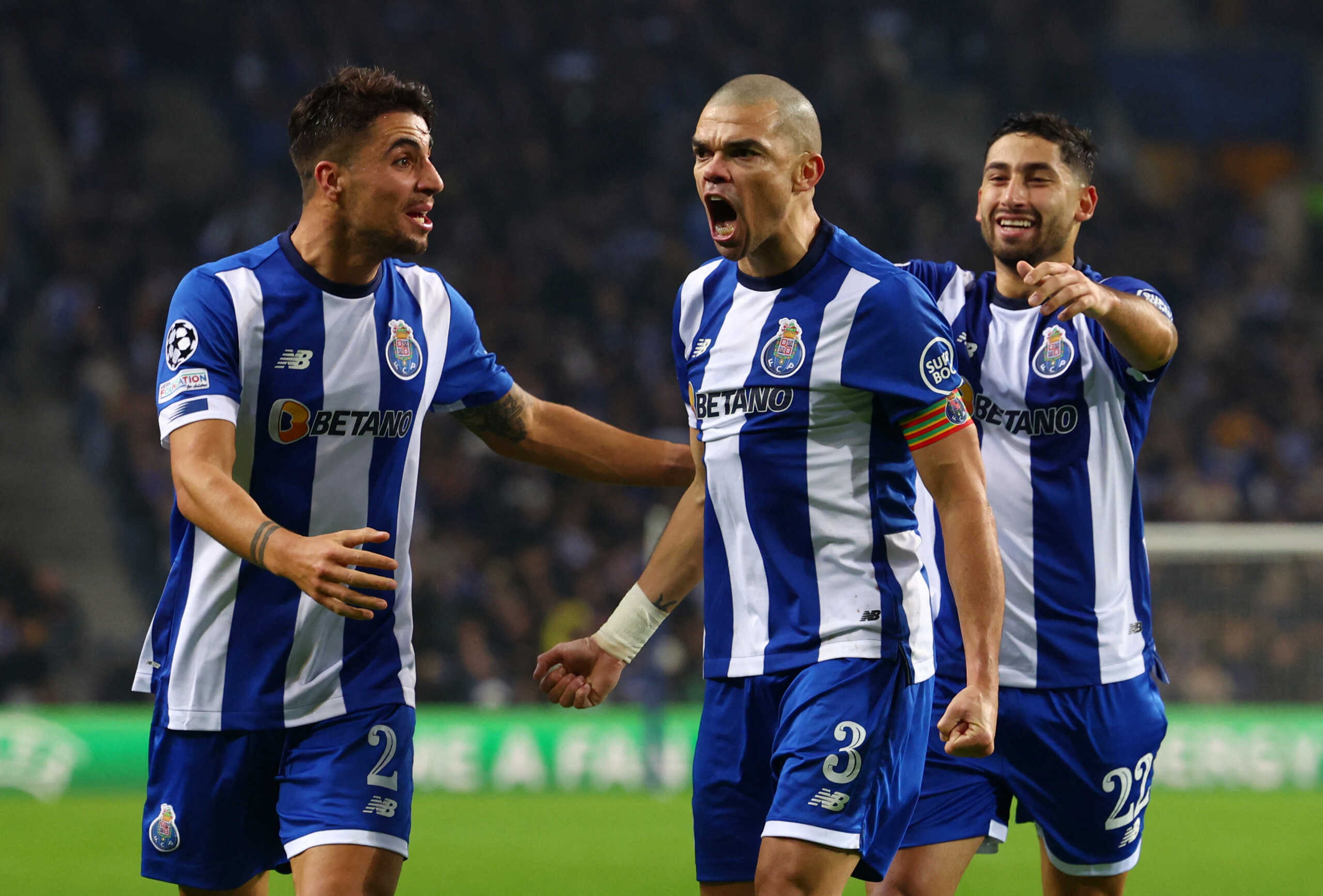 Soccer Football - Champions League - Group H - FC Porto v Shakhtar Donetsk - Estadio do Dragao, Porto, Portugal - December 13, 2023 FC Porto's Pepe celebrates scoring their fourth goal with Fabio Cardoso and Alan Varela REUTERS