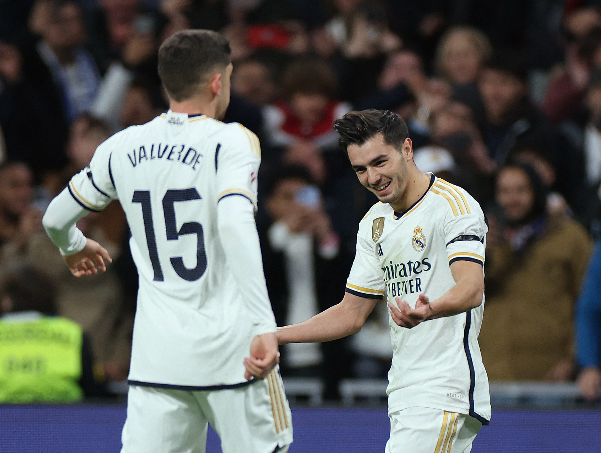 Soccer Football - Spain - LaLiga - Real Madrid v Granada - Santiago Bernabeu, Madrid, Spain - December 2, 2023 Real Madrid's Brahim Diaz celebrates scoring their first goal with Federico Valverde REUTERS