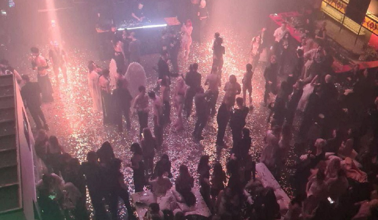 People attend an "almost naked" party organized by Russian blogger Anastasia (Nastya) Ivleeva at Mutabor nightclub in Moscow, Russia, in this image published December 21, 2023. Ostorozhno Novosti via REUTERS ATTENTION EDITORS - THIS IMAGE WAS PROVIDED BY A THIRD PARTY. NO RESALES. NO ARCHIVES. MANDATORY CREDIT.