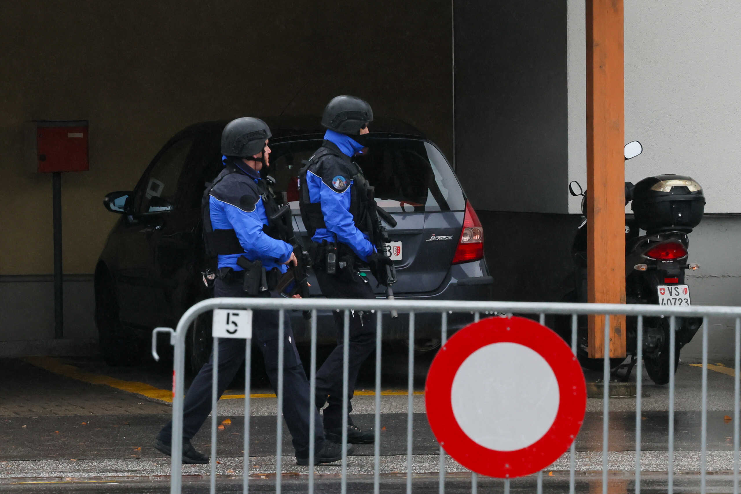 Police secure the area after a shooting in the Swiss town of Sion, Switzerland, December 11, 2023. REUTERS