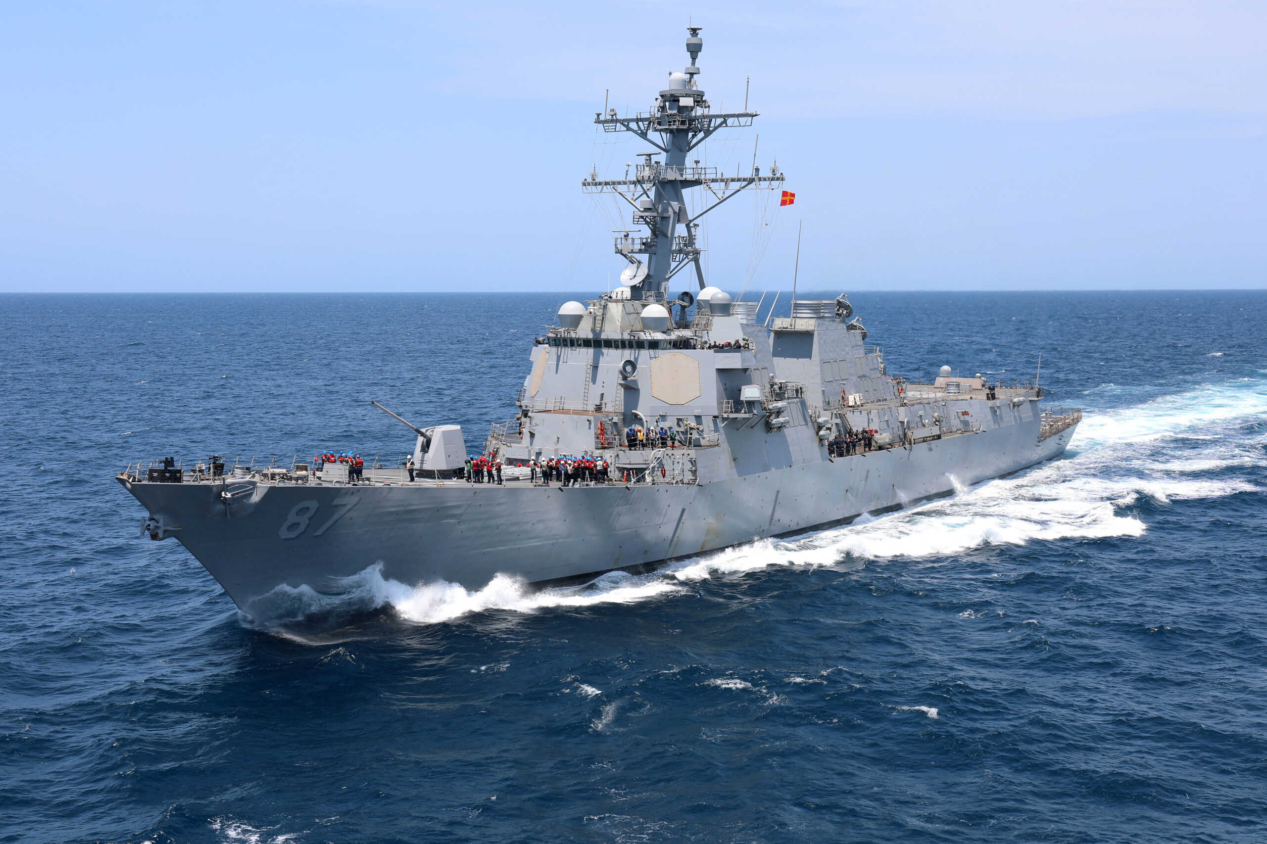 The U.S. Navy guided-missile destroyer USS Mason pulls alongside a fleet replenishment oiler in the Atlantic Ocean, July 17, 2021.  U.S. Navy