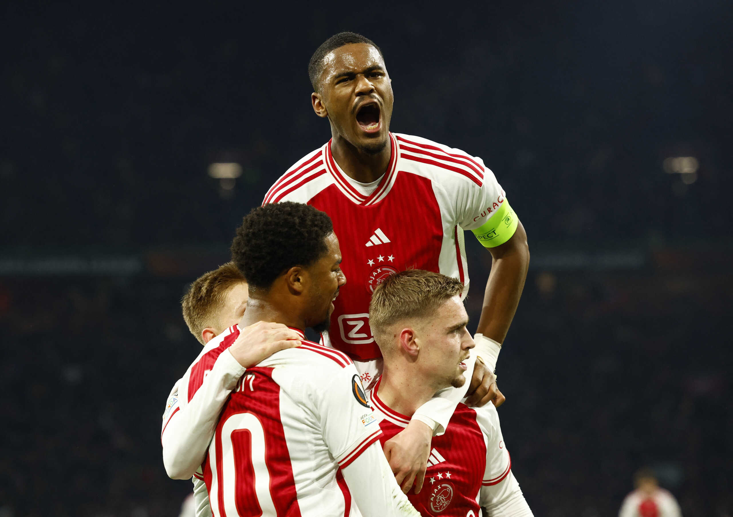 Soccer Football - Europa League - Group B - Ajax Amsterdam v AEK Athens - Johan Cruijff Arena, Amsterdam, Netherlands - December 14, 2023 Ajax Amsterdam's Kenneth Taylor celebrates scoring their second goal with Jorrel Hato REUTERS