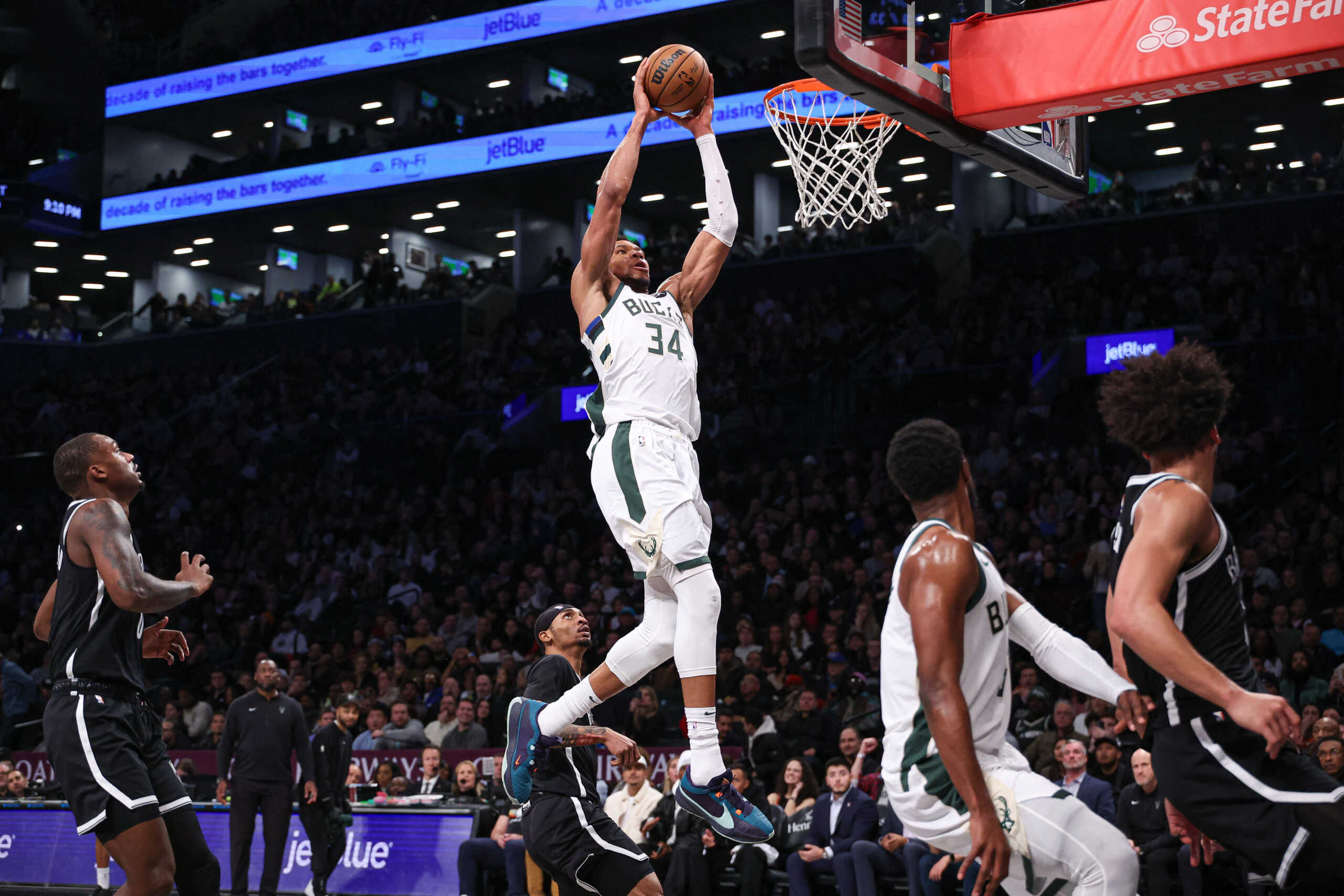 Dec 27, 2023; Brooklyn, New York, USA; Milwaukee Bucks forward Giannis Antetokounmpo (34) goes up for a dunk during the second half against the Brooklyn Nets at Barclays Center. Mandatory Credit: Vincent Carchietta-USA TODAY Sports