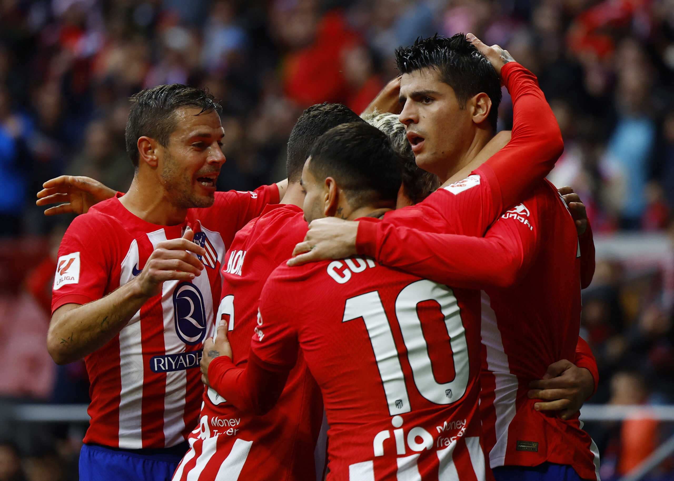 Soccer Football - LaLiga - Atletico Madrid v Almeria - Metropolitano, Madrid, Spain - December 10, 2023 Atletico Madrid's Alvaro Morata celebrates scoring their first goal with Angel Correa and Cesar Azpilicueta REUTERS