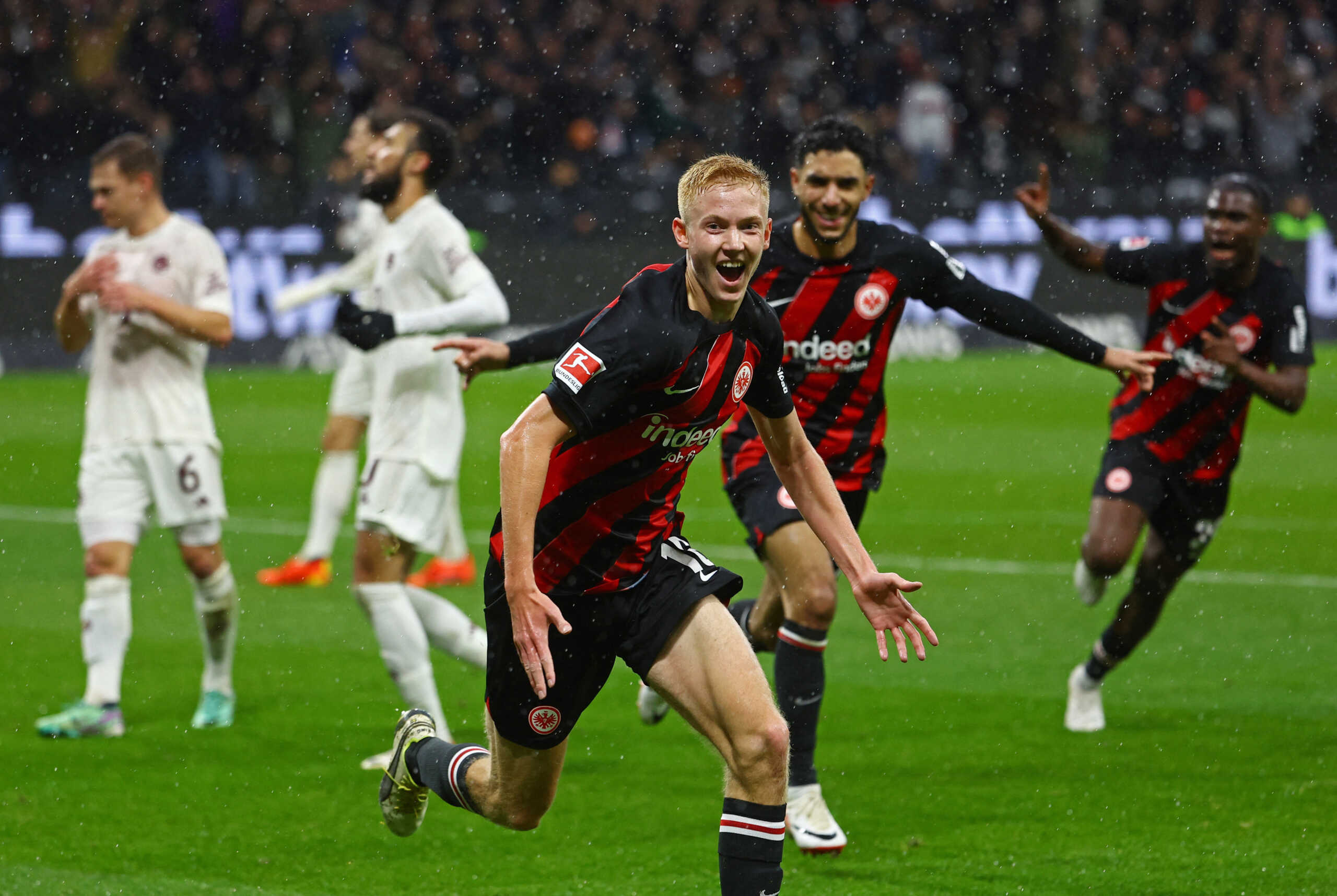 Soccer Football - Bundesliga - Eintracht Frankfurt v Bayern Munich - Deutsche Bank Park, Frankfurt, Germany - December 9, 2023 Eintracht Frankfurt's Hugo Larsson celebrates after scoring their third goal REUTERS