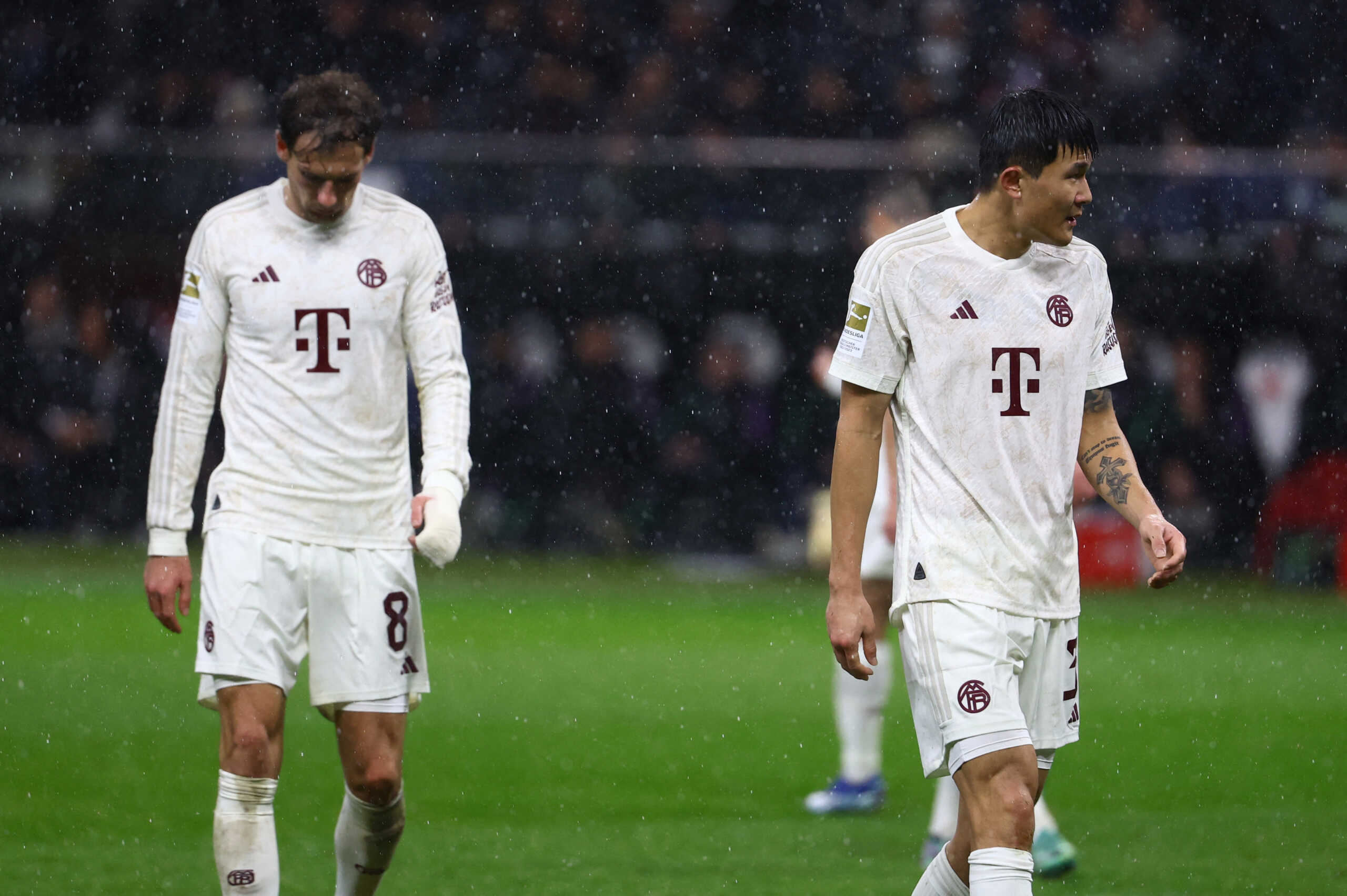 Soccer Football - Bundesliga - Eintracht Frankfurt v Bayern Munich - Deutsche Bank Park, Frankfurt, Germany - December 9, 2023 Bayern Munich's Kim Min-jae and Leon Goretzka during the match REUTERS