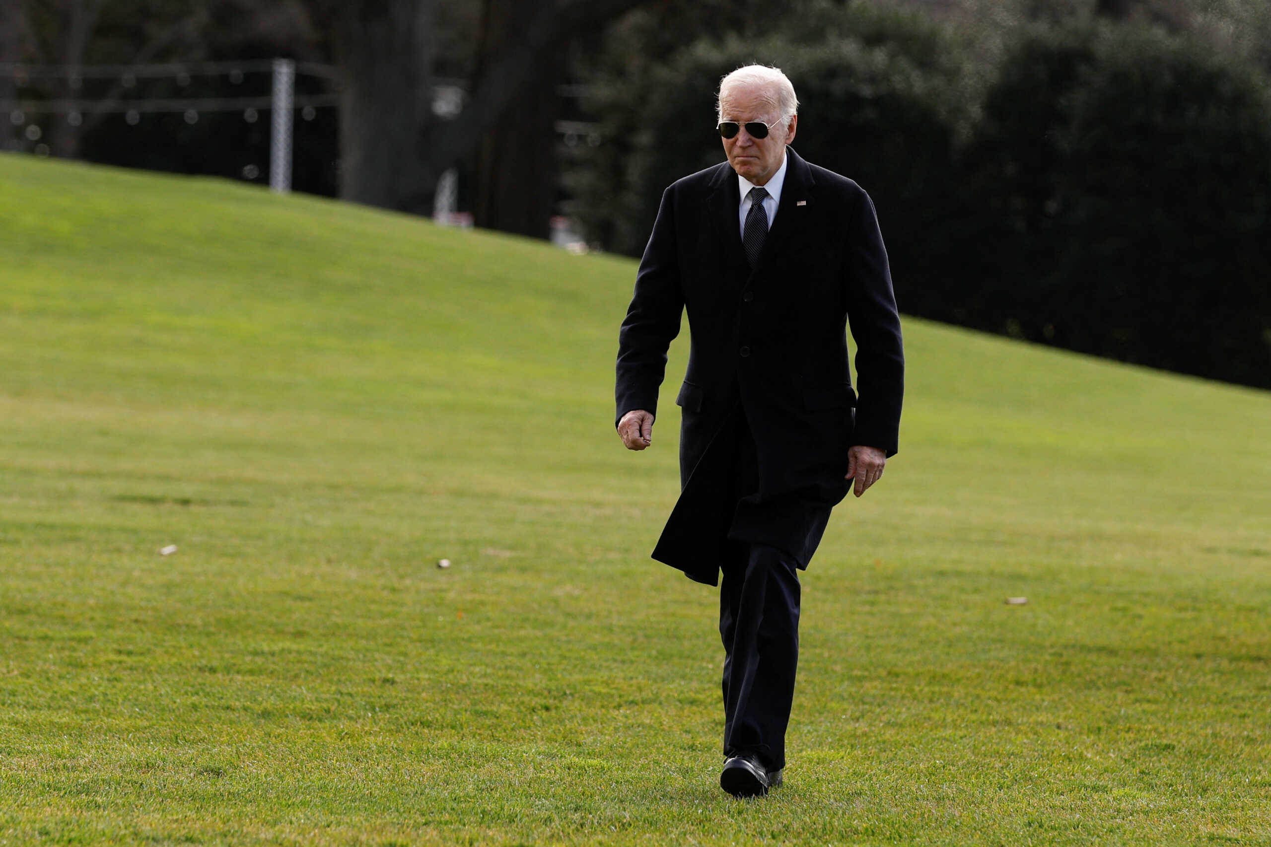 U.S. President Joe Biden walks into the White House from Marine One in Washington, U.S., December 19, 2023. REUTERS