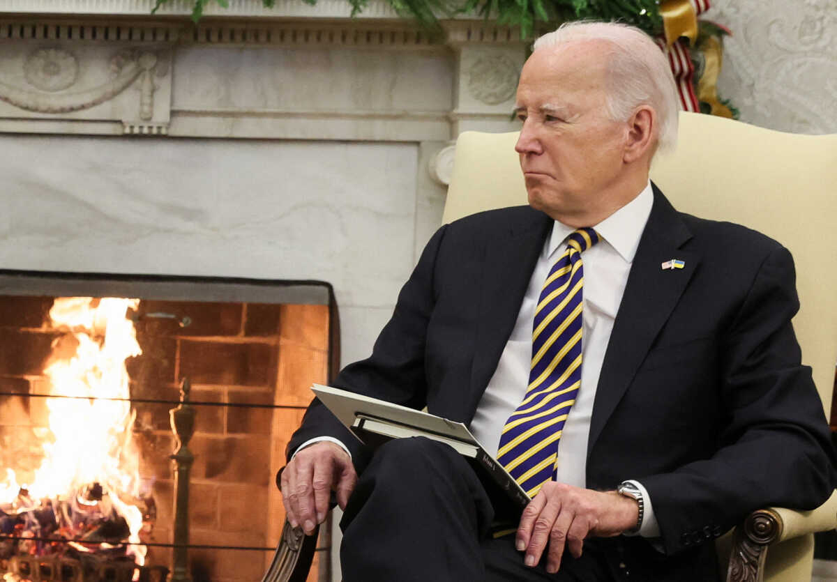 U.S. President Joe Biden listens during a meeting with Ukraine's President Volodymyr Zelenskiy in the Oval Office at the White House in Washington, U.S., December 12, 2023. REUTERS