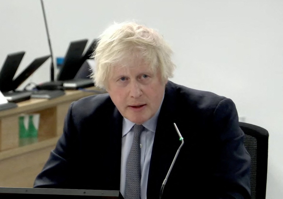 Former British Prime Minister Boris Johnson gives evidence at the COVID-19 Inquiry, in London, Britain, December 6, 2023 in this screen grab obtained from a handout video. UK Covid-19 Inquiry