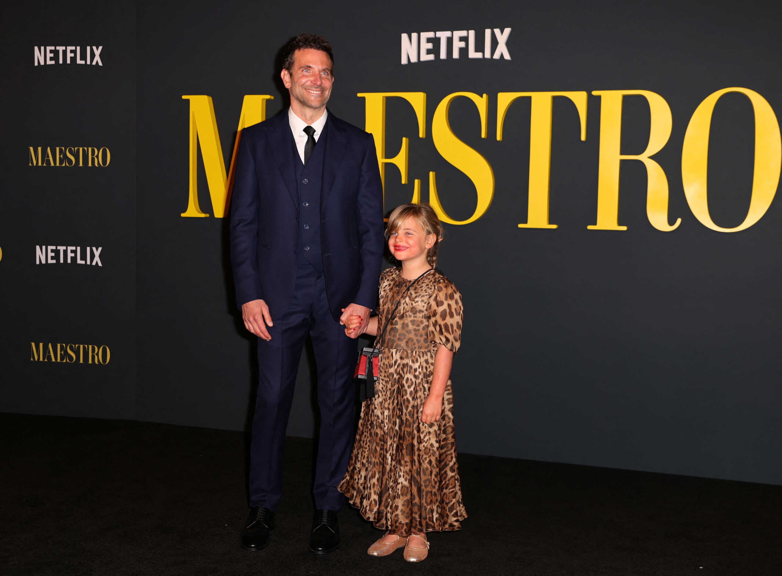 Bradley Cooper and his daughter Lea De Seine attend the red carpet premiere of the Netflix movie "Maestro" at the Academy Museum of Motion Pictures in Los Angeles, California, U.S. December 12, 2023. REUTERS