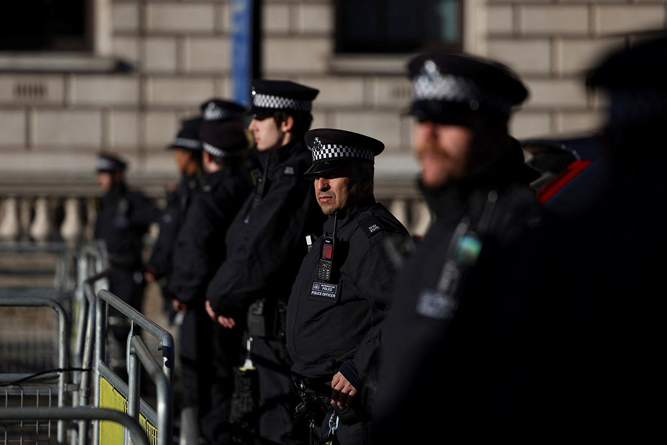 Police officers stand guard at Whitehall on the day of a demonstration in solidarity with Palestinians in Gaza, amid the ongoing conflict between Israel and the Palestinian Islamist group Hamas, in London, Britain, November 11, 2023. REUTERS