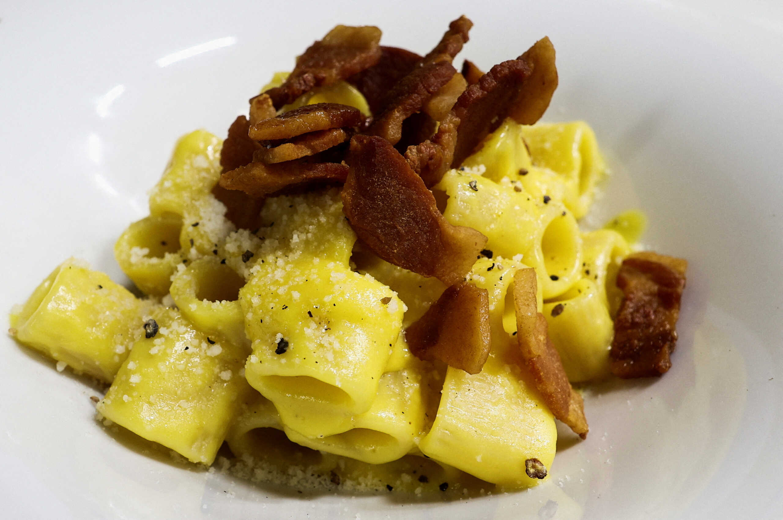 A view of a plate of pasta Carbonara at "La Carbonara" restaurant in Campo de' Fiori in Rome, Italy, December 14, 2023. REUTERS