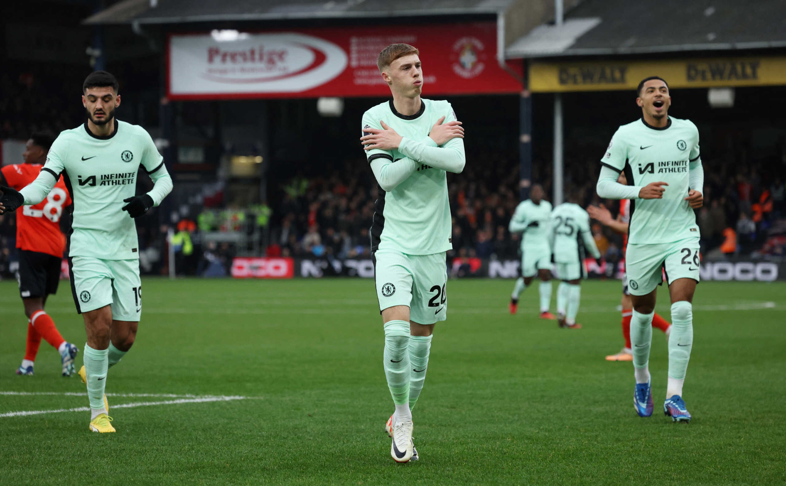 Soccer Football - Premier League - Luton Town v Chelsea - Kenilworth Road, Luton, Britain - December 30, 2023 Chelsea's Cole Palmer celebrates scoring their first goal with Levi Colwill and Armando Broja REUTERS