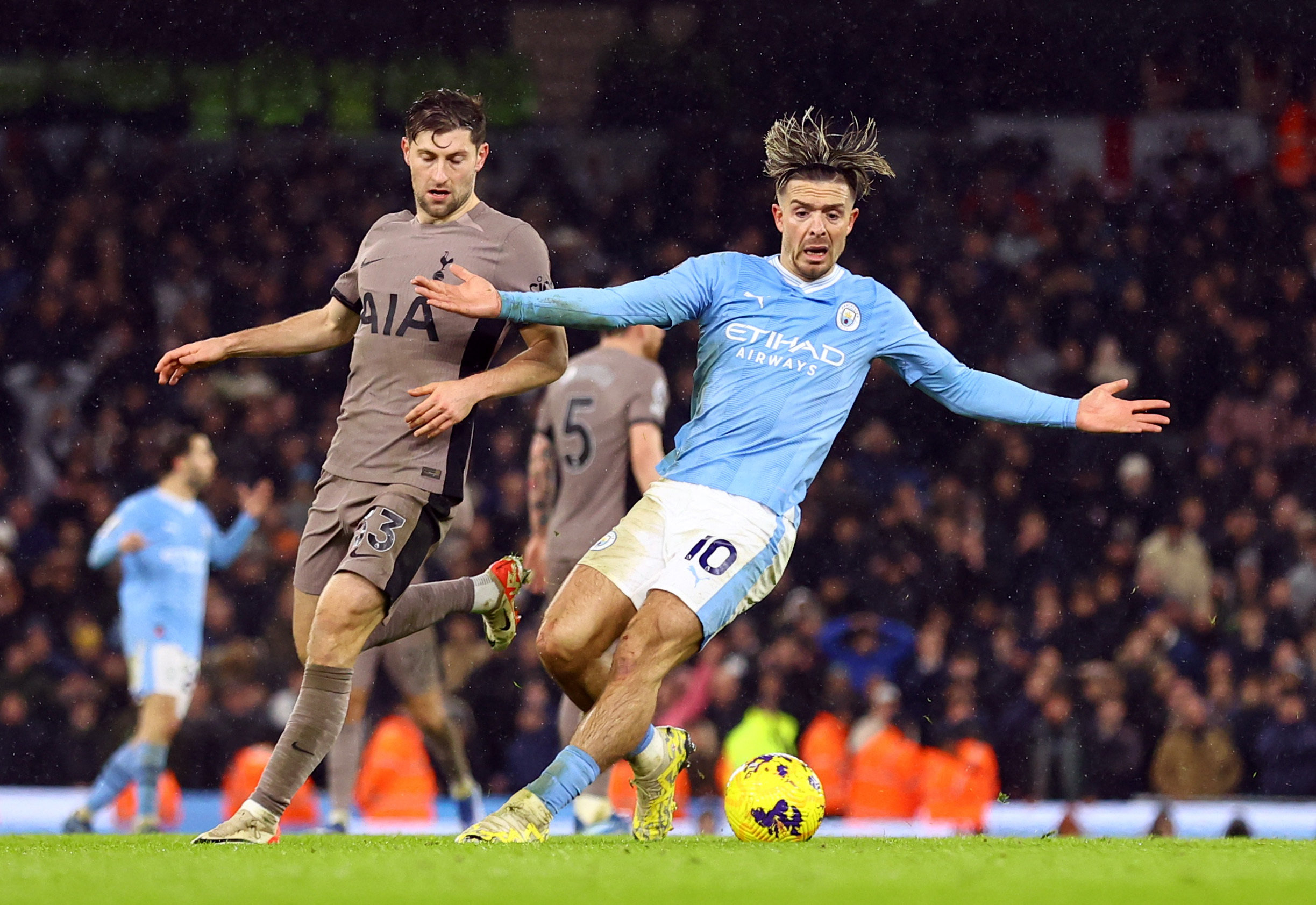 Soccer Football - Premier League - Manchester City v Tottenham Hotspur - Etihad Stadium, Manchester, Britain - December 3, 2023 Tottenham Hotspur's Ben Davies in action with Manchester City's Jack Grealish REUTERS