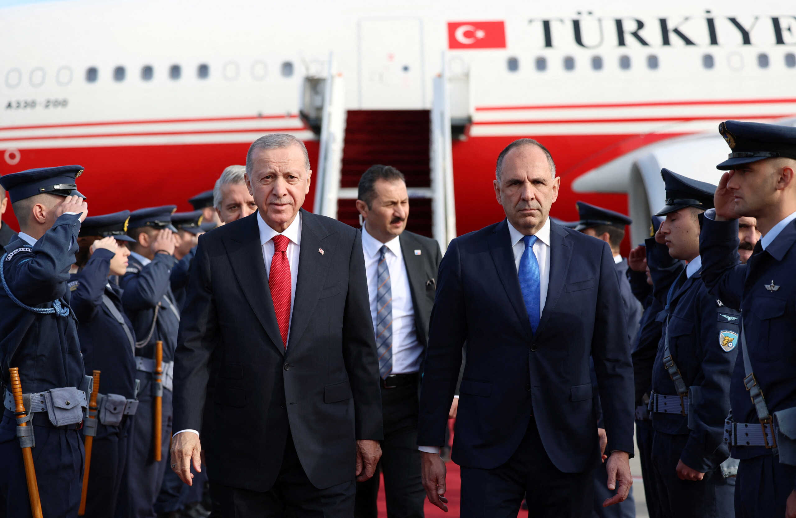 Turkish President Tayyip Erdogan is welcomed by Greek Foreign Minister George Gerapetritis upon his arrival at the Eleftherios Venizelos International Airport in Athens, Greece December 7, 2023. Turkish Presidential Press Office