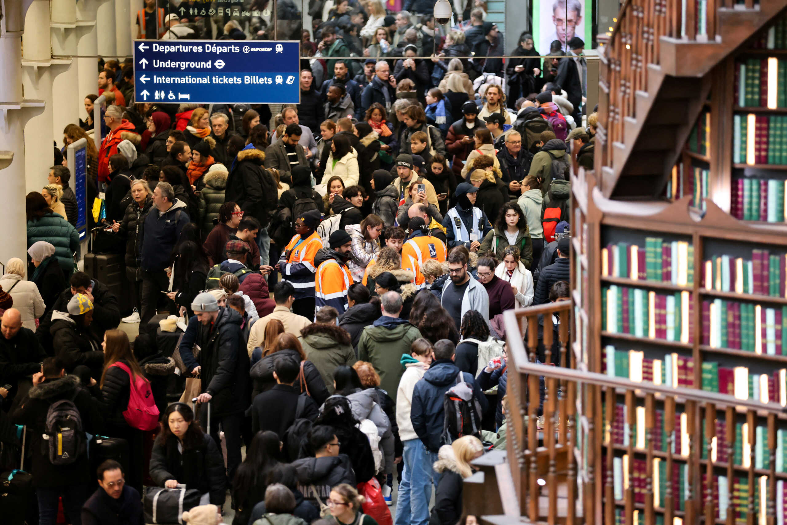 Passengers gather at the departure gates of the Eurostar terminal at St Pancras International Station after the services are cancelled due to a flooded tunnel, in London, Britain, December 30, 2023. REUTERS