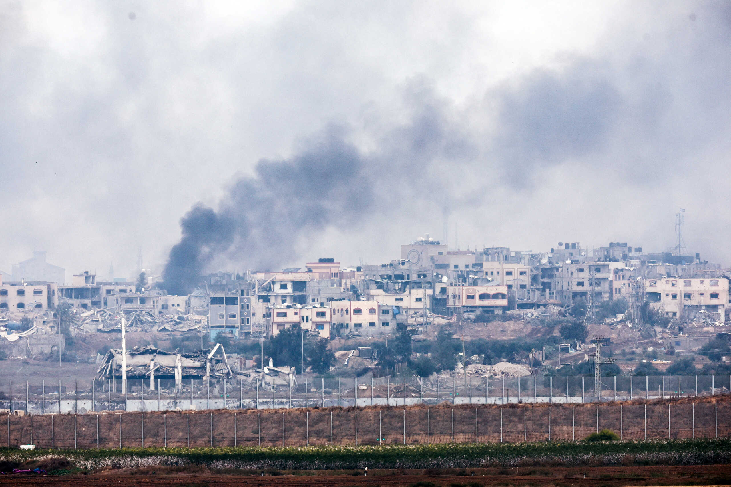 Smoke rises inside northern Gaza Strip following an airstrike, amid the ongoing conflict between Israel and the Palestinian Islamist group Hamas, as seen from southern Israel, December 14, 2023. REUTERS