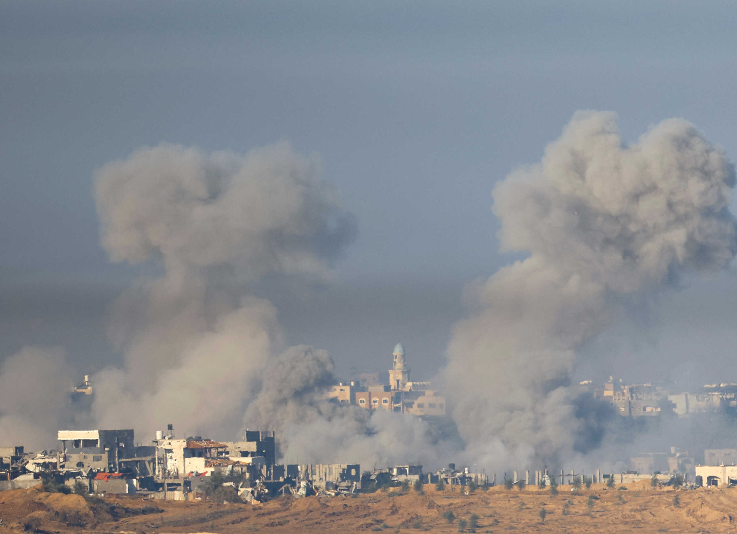 Smoke from an explosion rises in Gaza, after a temporary truce between Israel and the Palestinian Islamist group Hamas expired, as seen from southern Israel, December 3, 2023. REUTERS