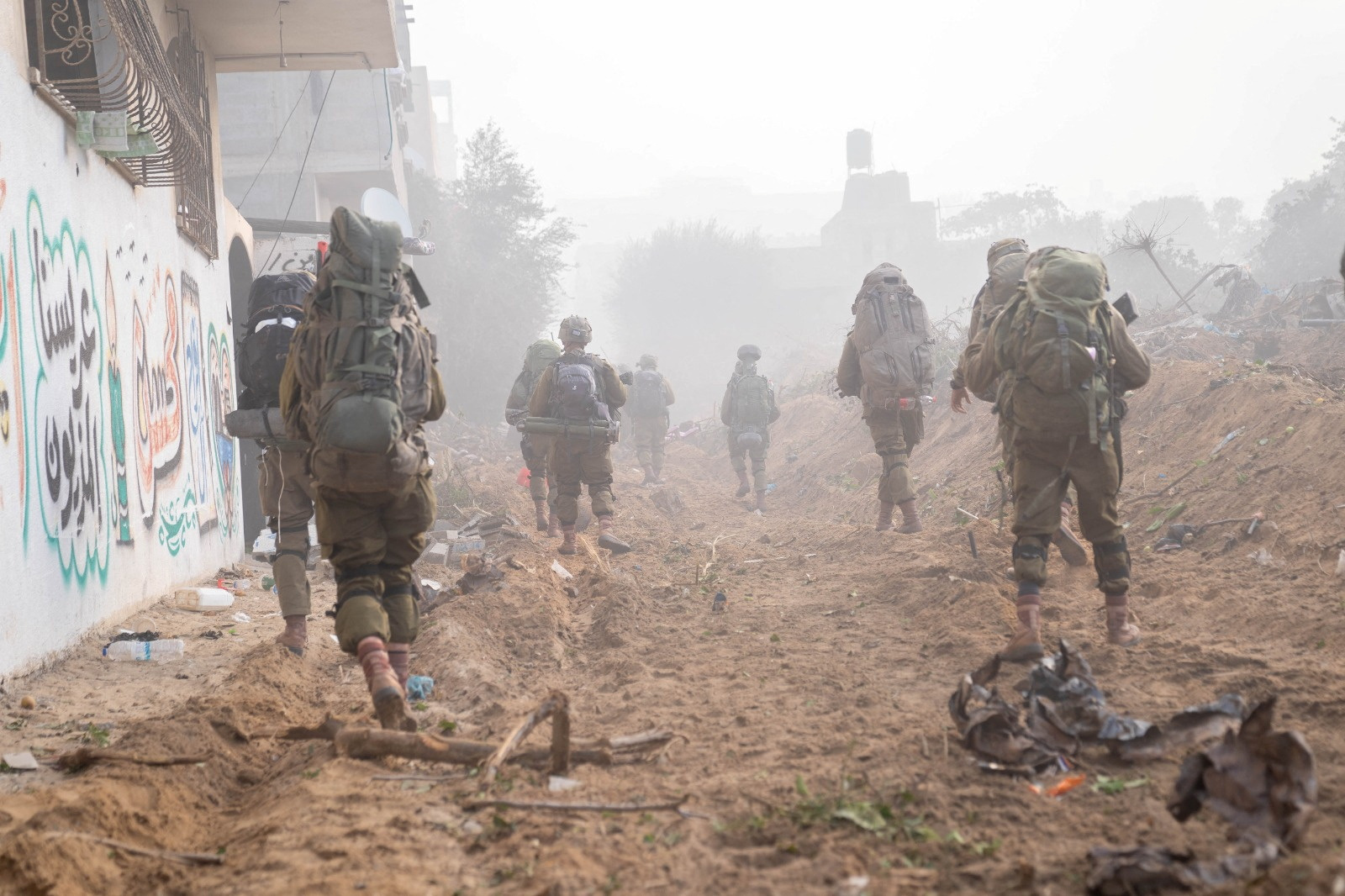 Israeli members of the military operate in the Gaza Strip, amid the ongoing conflict between Israel and the Palestinian Islamist group Hamas, in this handout image released December 12, 2023.    Israel Defense Forces