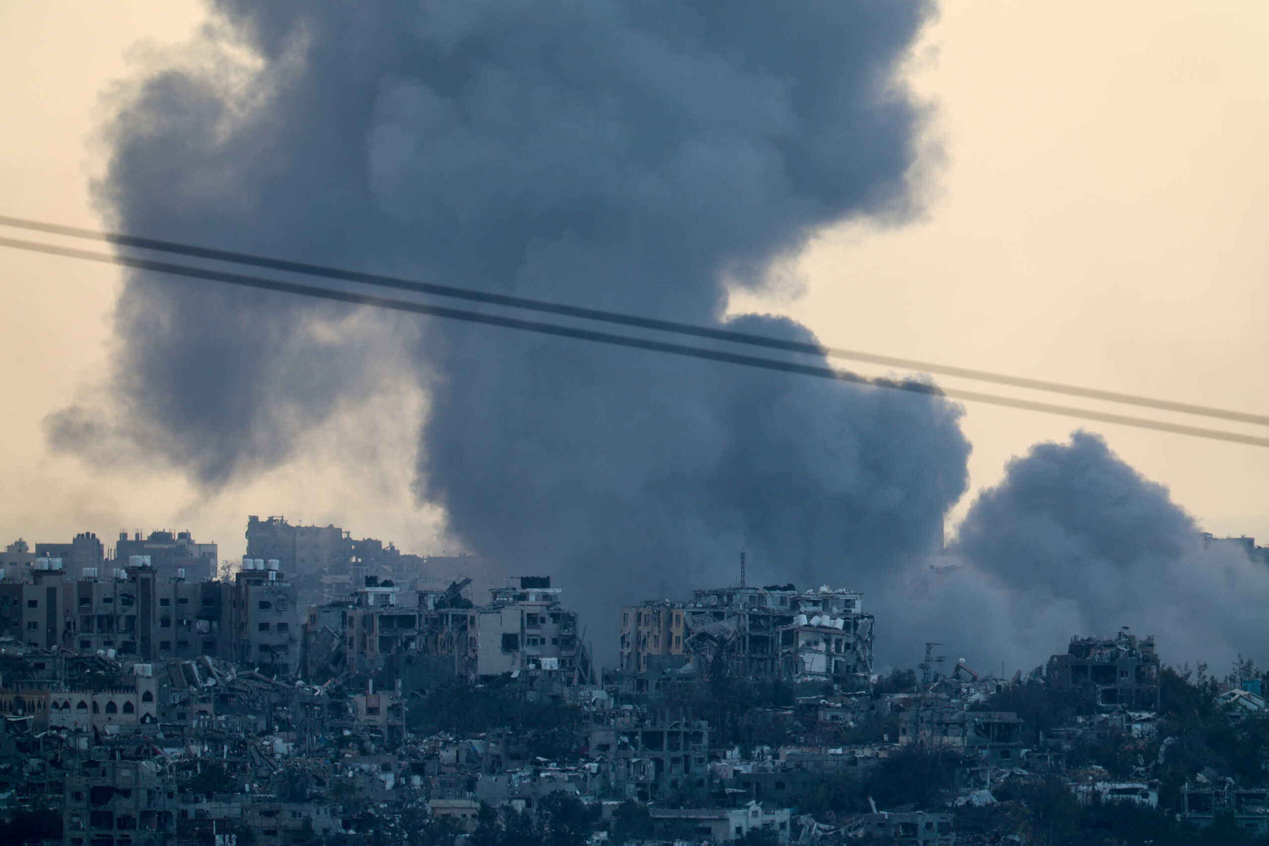 Smoke rises over Gaza, amid the ongoing conflict between Israel and the Palestinian Islamist group Hamas, as seen from southern Israel, December 24, 2023. REUTERS