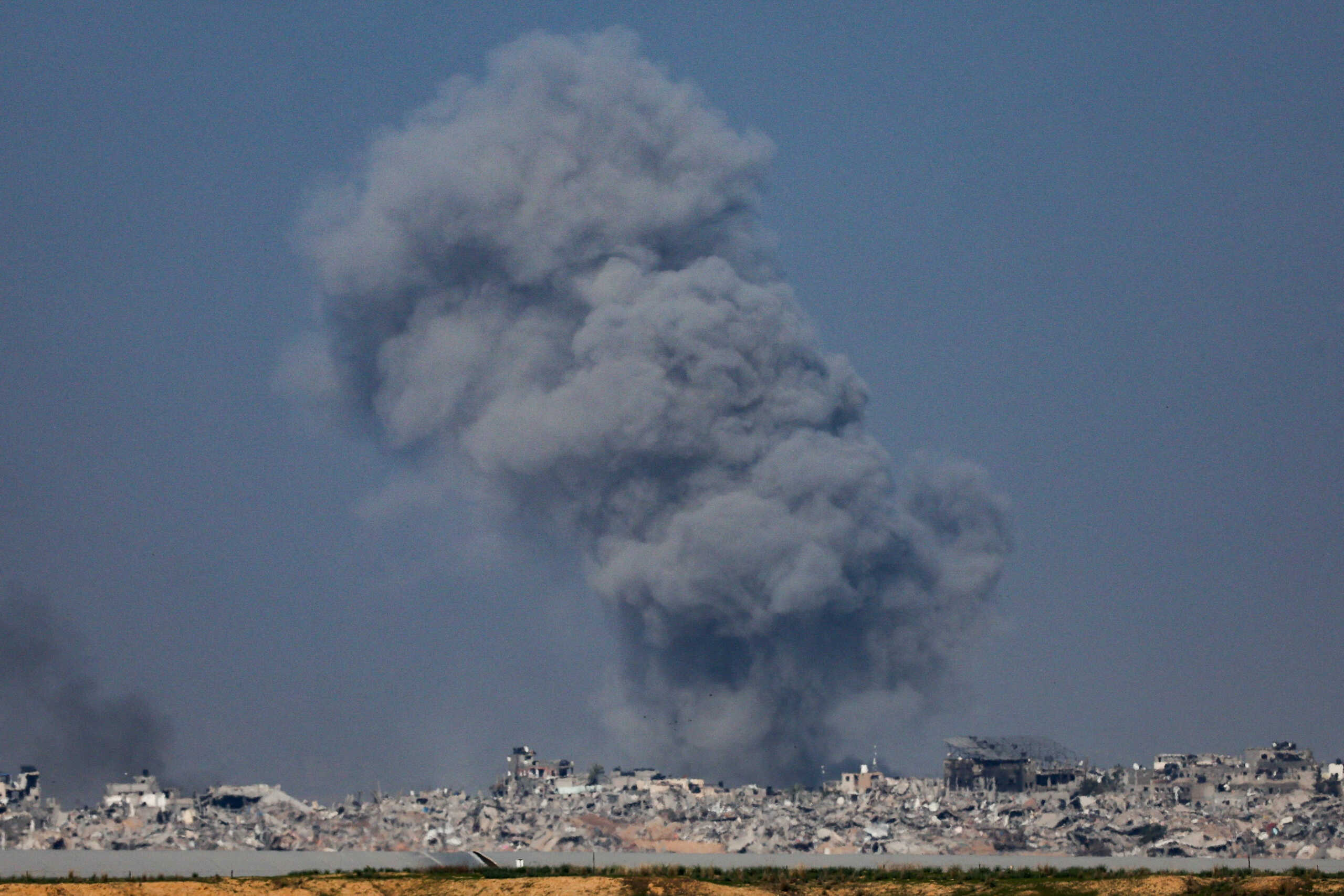 Smoke rises in the Gaza Strip, amid the ongoing conflict between Israel and the Palestinian Islamist group Hamas, as seen from southern Israel, December 20, 2023. REUTERS