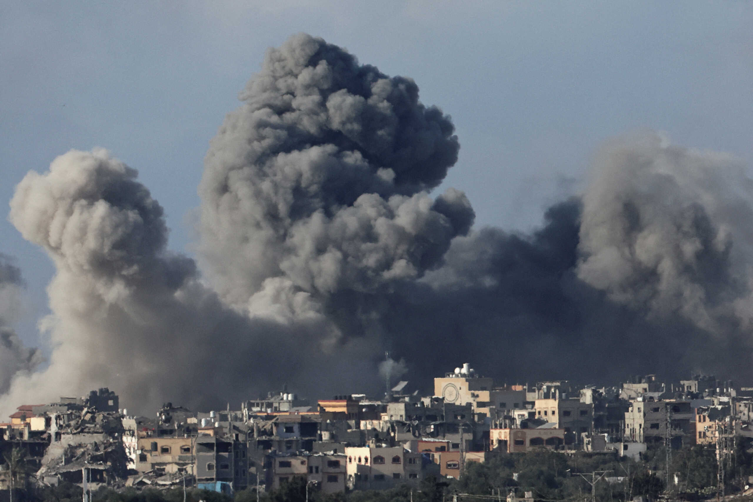 Smoke rises over Gaza, amid the ongoing conflict between Israel and the Palestinian Islamist group Hamas, as seen from southern Israel, December 9, 2023. REUTERS