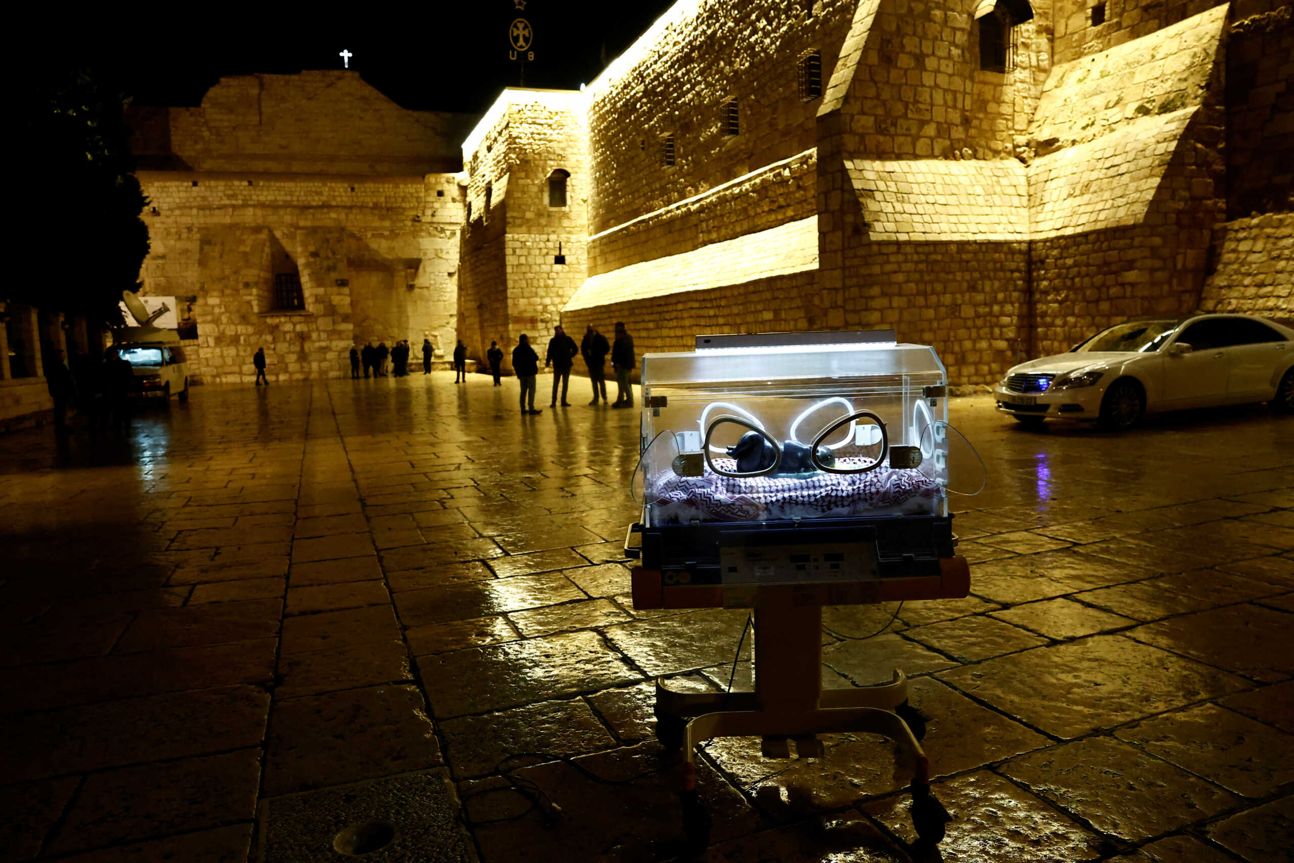 An installation by Rana Bishara shows a figure of baby Jesus, made by Sana Fara Bishara, inside an incubator in front the Church of the Nativity in support of Gaza, in Bethlehem, in the Israeli-occupied West Bank, December 24, 2023. REUTERS