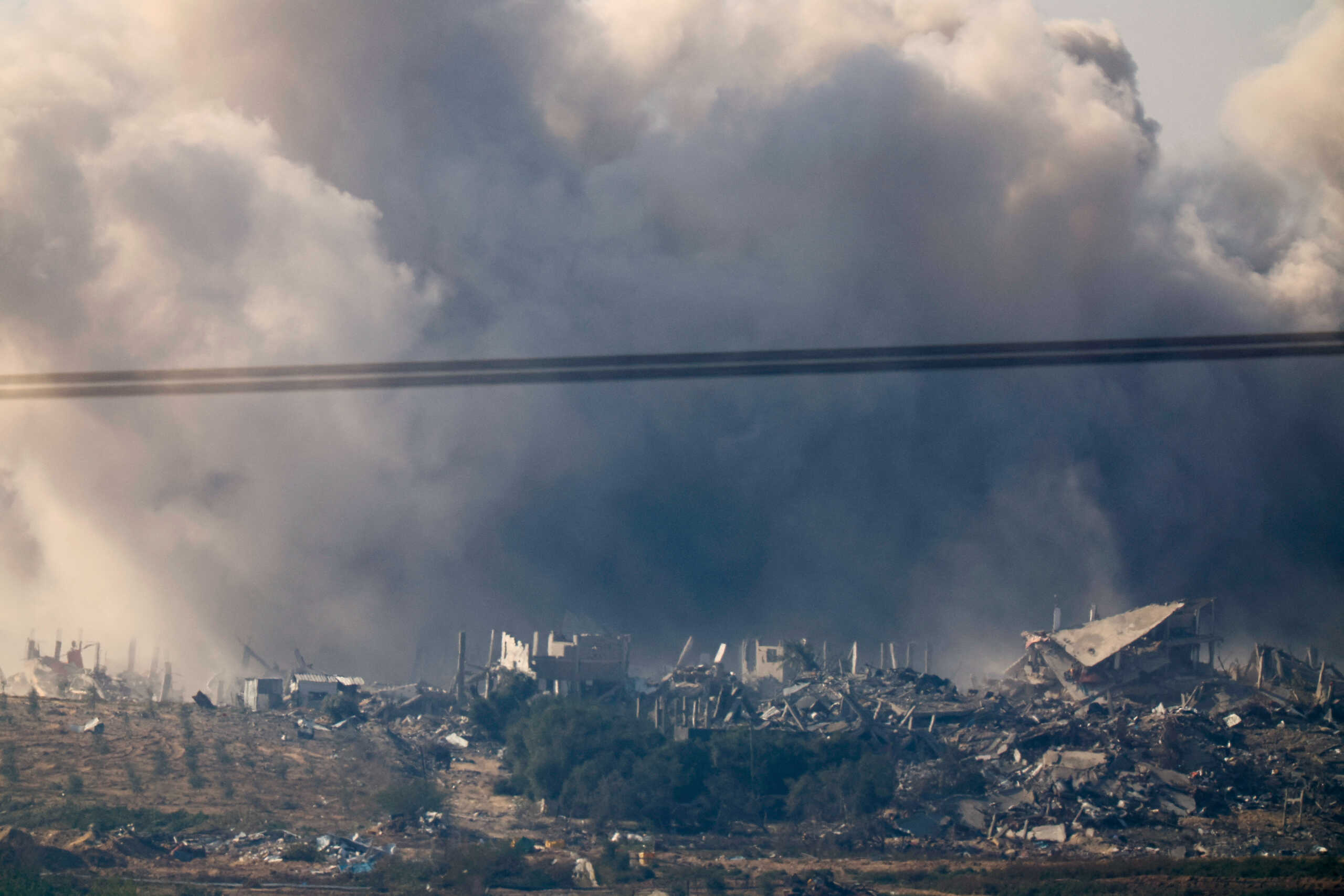 Smoke from an explosion rises in Gaza, after a temporary truce between Israel and the Palestinian Islamist group Hamas expired, as seen from southern Israel, December 2, 2023. REUTERS
