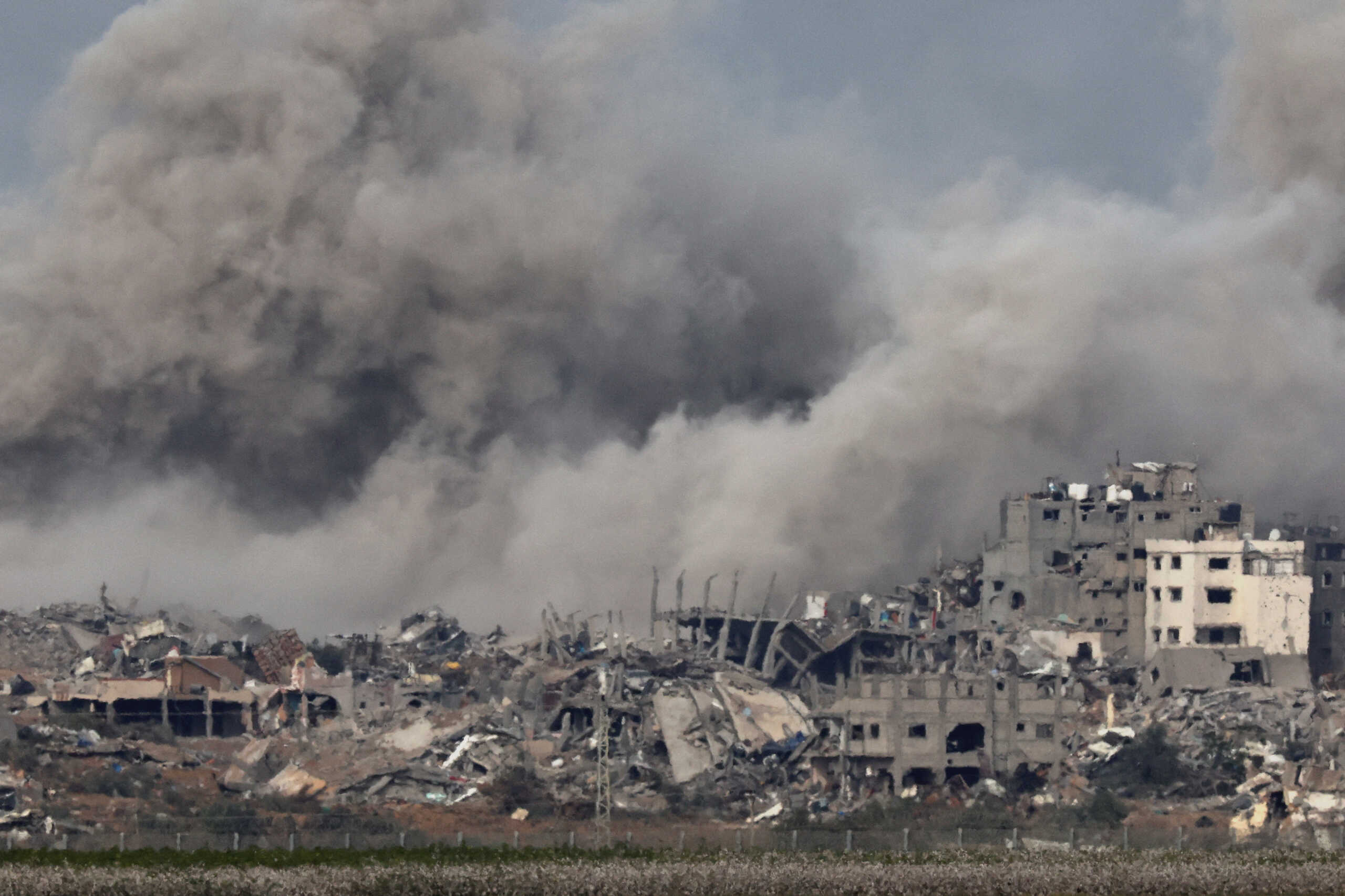 Smoke rises over Gaza, amid the ongoing conflict between Israel and the Palestinian Islamist group Hamas, as seen from southern Israel, December 9, 2023. REUTERS