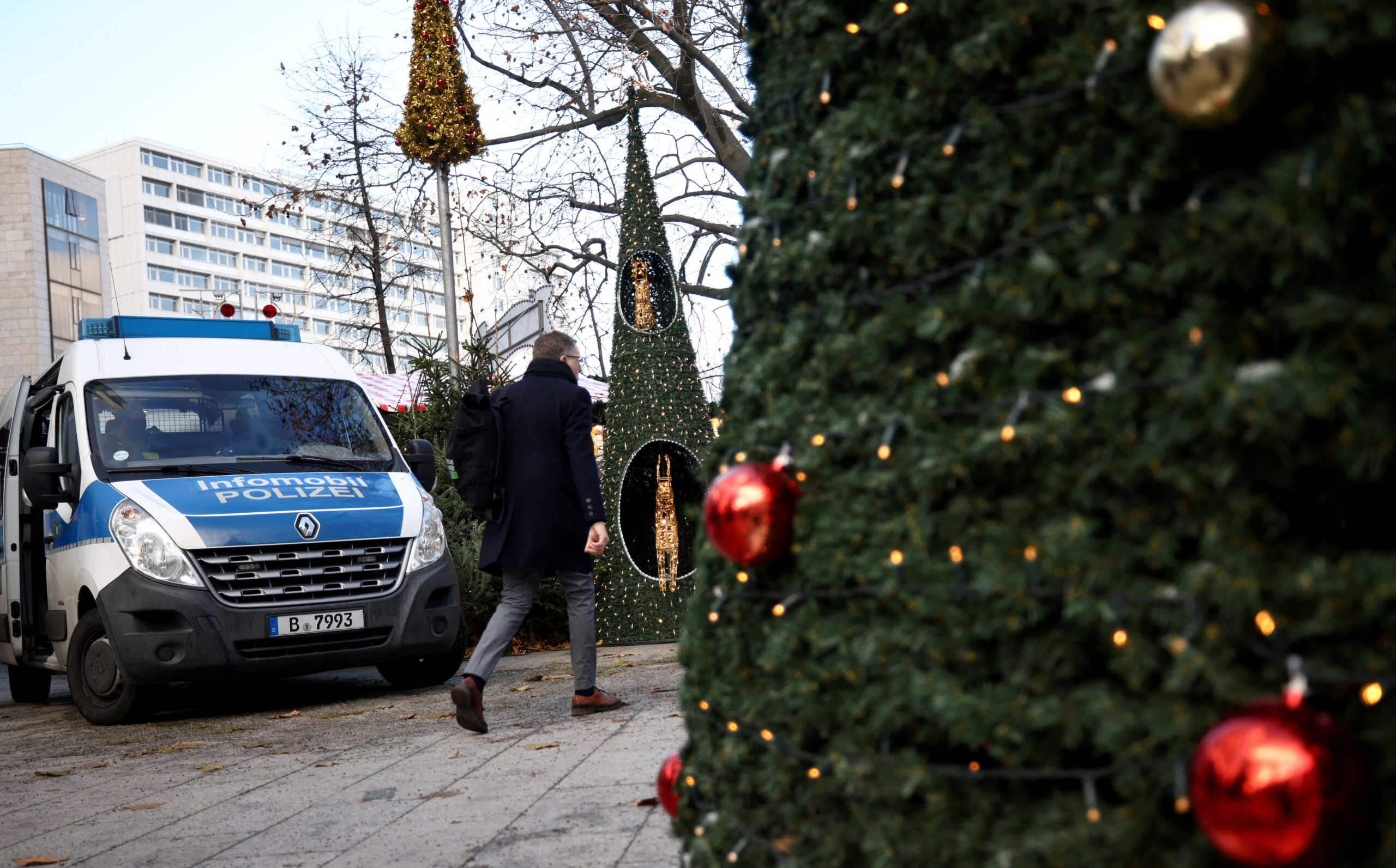 A police car is parked at Breitscheidplatz Christmas Market with heightened safety measures in Berlin, Germany November 30, 2023. REUTERS