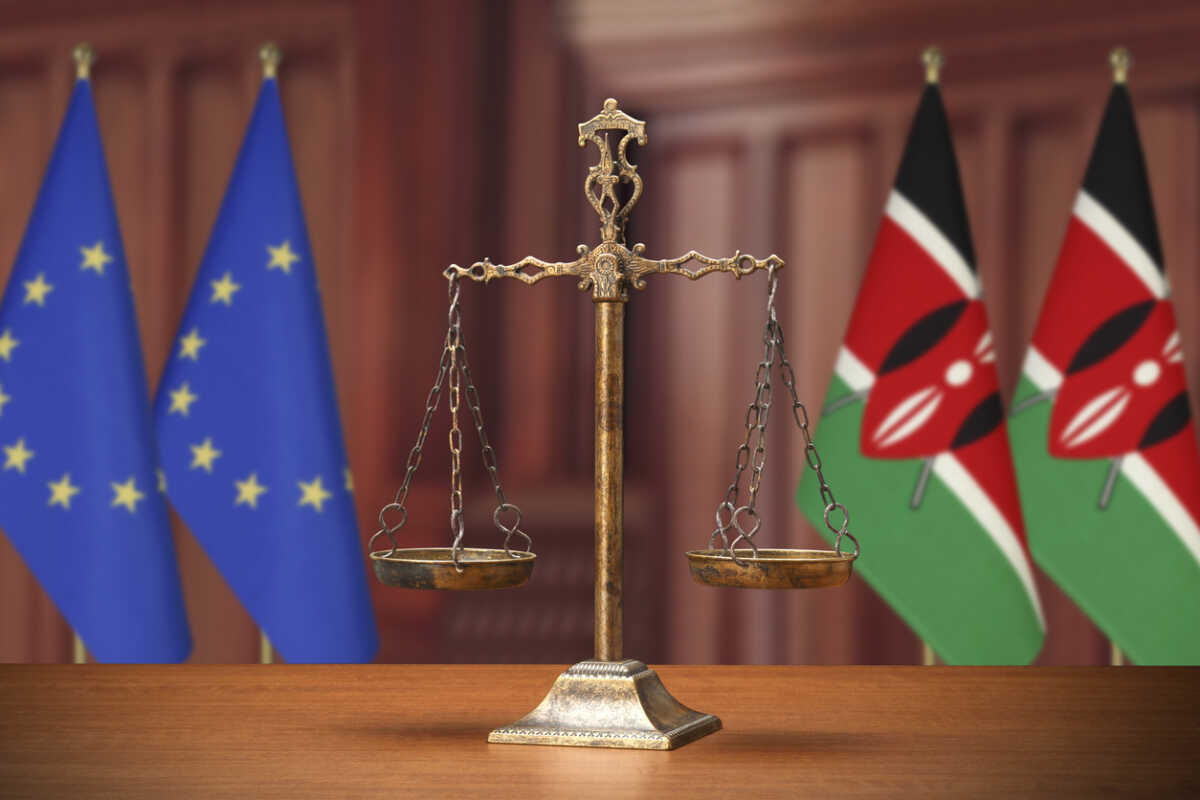 Law Symbols on wooden table with national flag