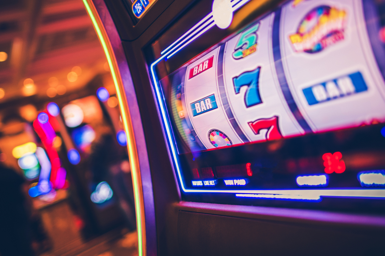 Slot Machine One Handed Bandit Game. Rolling Drums. Casinos and Gambling Industry.