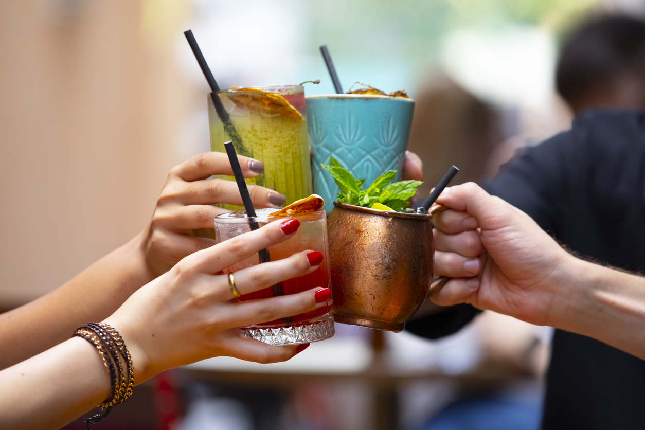 Group of cheers.
A cocktail is an alcoholic mixed drink. Most commonly, cocktails are either a combination of spirits.