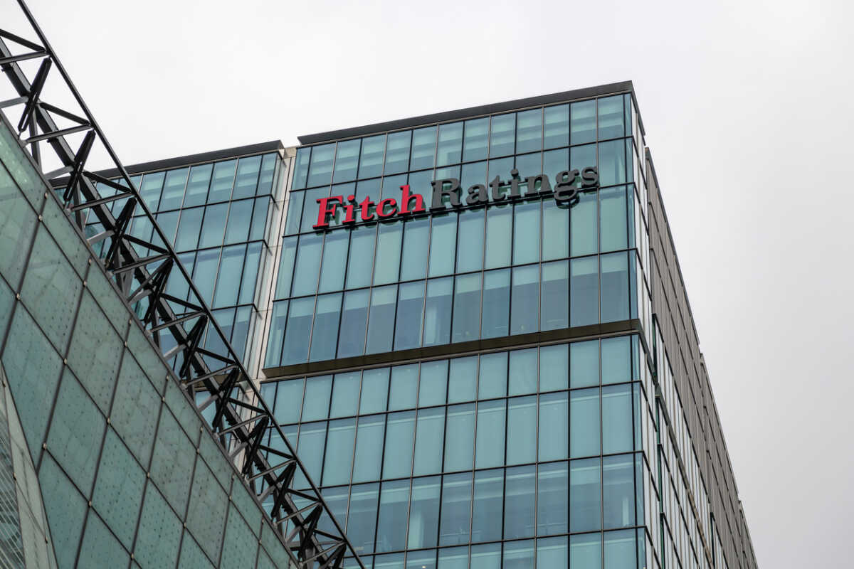 London. UK-03.30.2022. The offices and signage of the American rating agency Fitch Ratings in Canary Wharf.